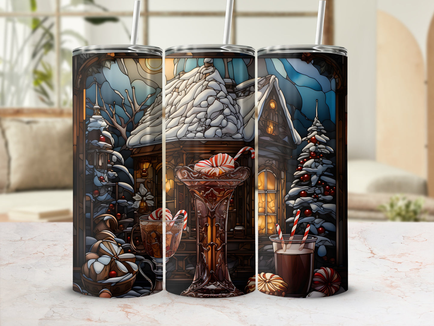Three tumblers featuring a snowy Christmas cottage scene with hot cocoa and candy canes.