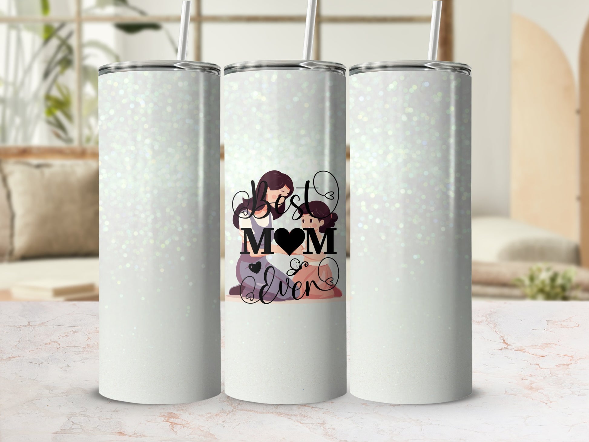 White glitter tumbler with "Best Mom Ever" graphic.