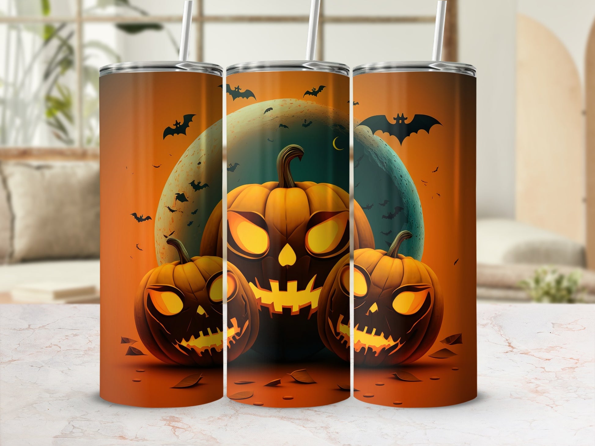 Three tumblers with a Halloween design featuring jack-o'-lanterns and bats against a moonlit sky.