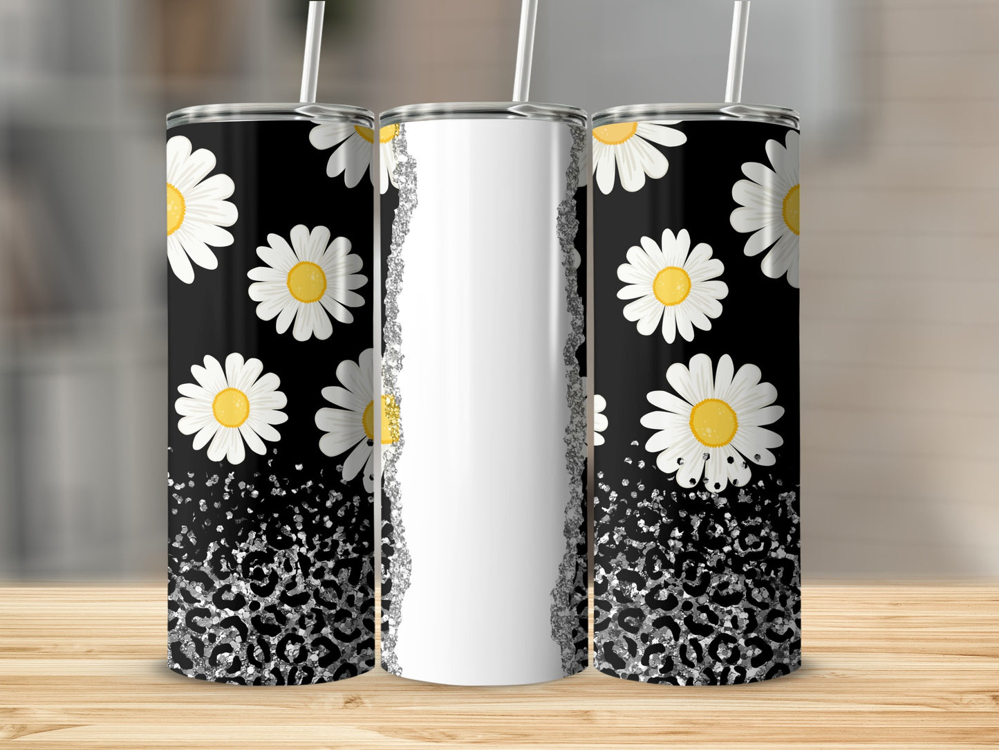 Two daisy-patterned tumblers with silver leopard print accents.