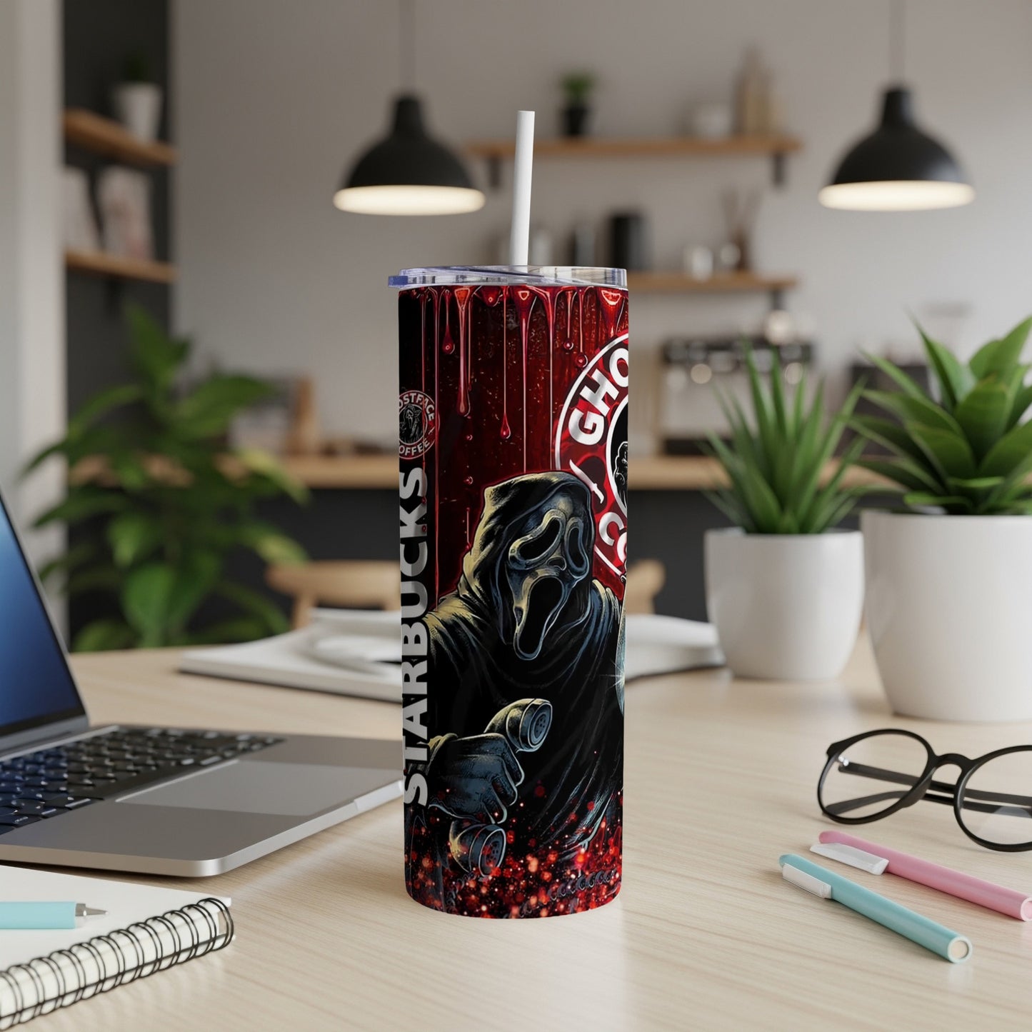 Tumbler with Ghostface and Starbucks logo design with a straw.