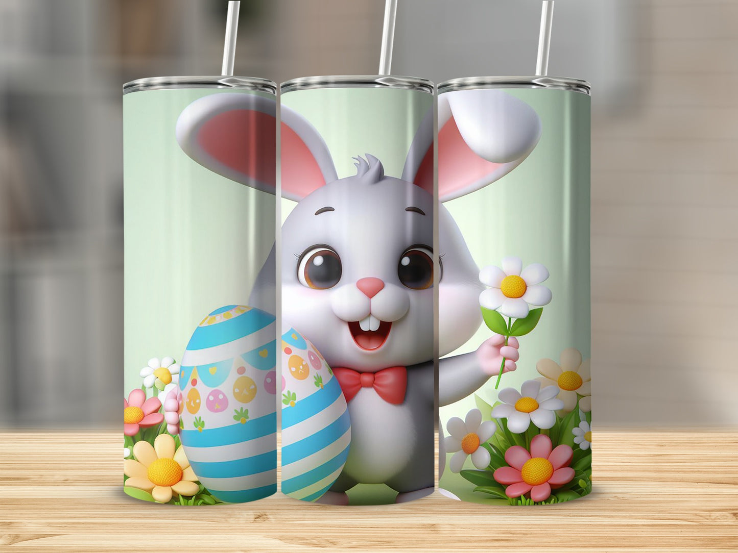 Easter bunny holding flower and decorated egg, two tumblers shown.