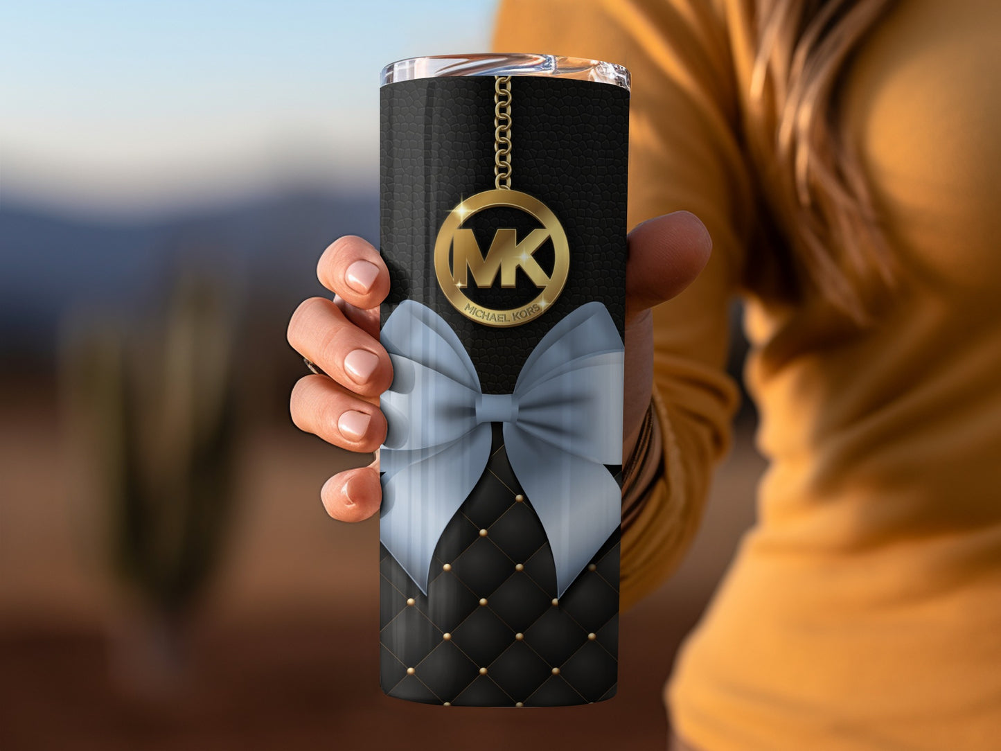 Elegant Black and Gold Bow Tumbler with MK Design