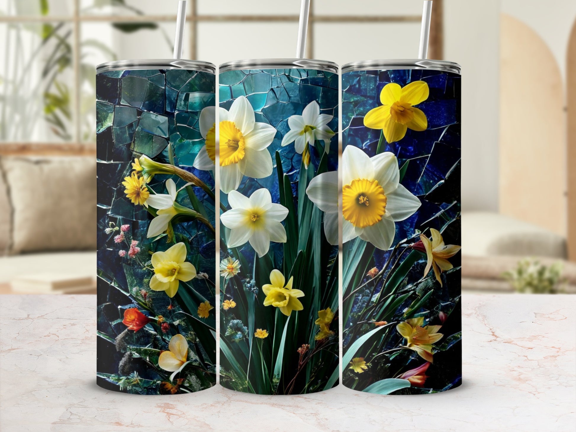 Floral tumbler with daffodils and greenery on a mosaic-inspired background.