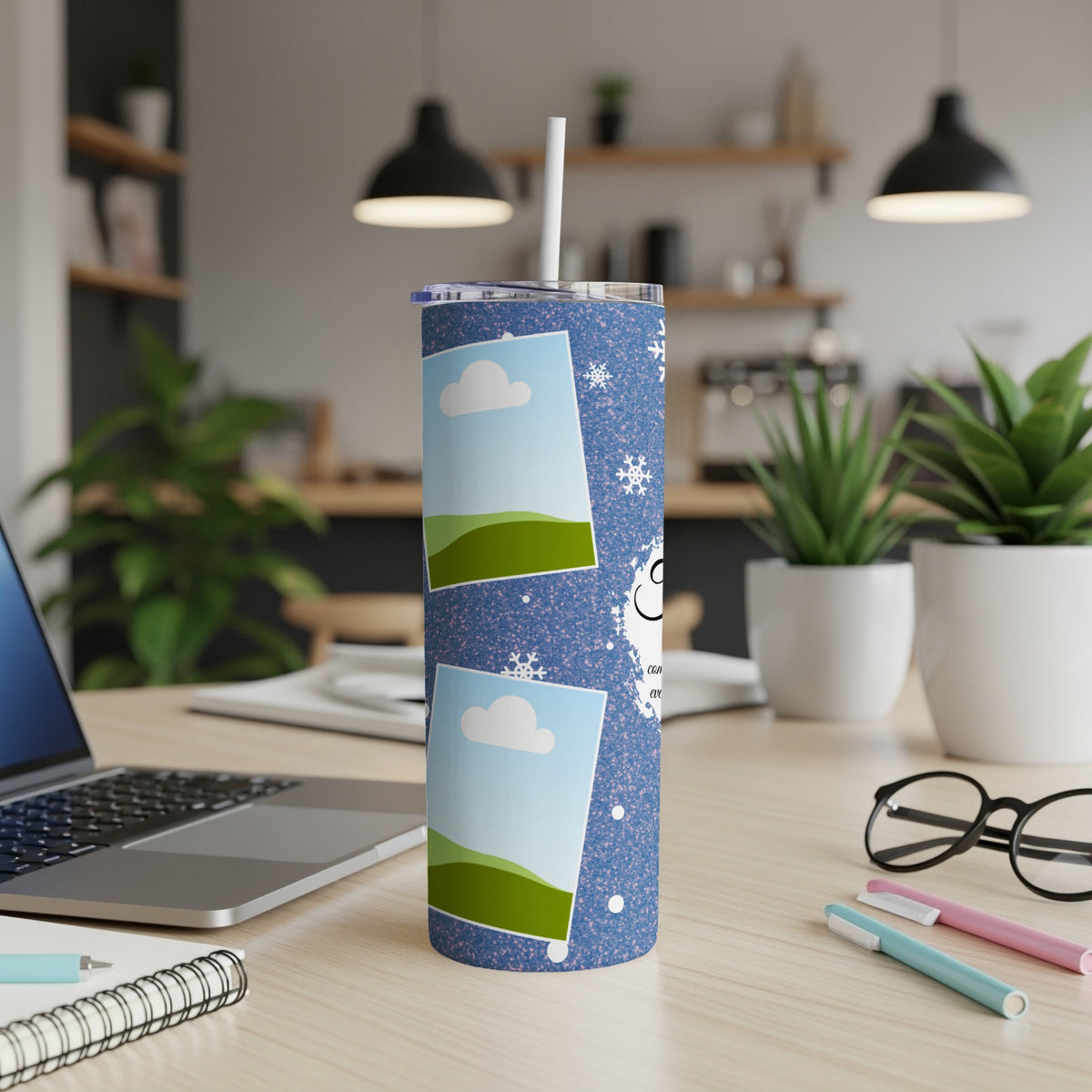 Blue glitter tumbler with photo frames, snowflakes, and a snowman design.