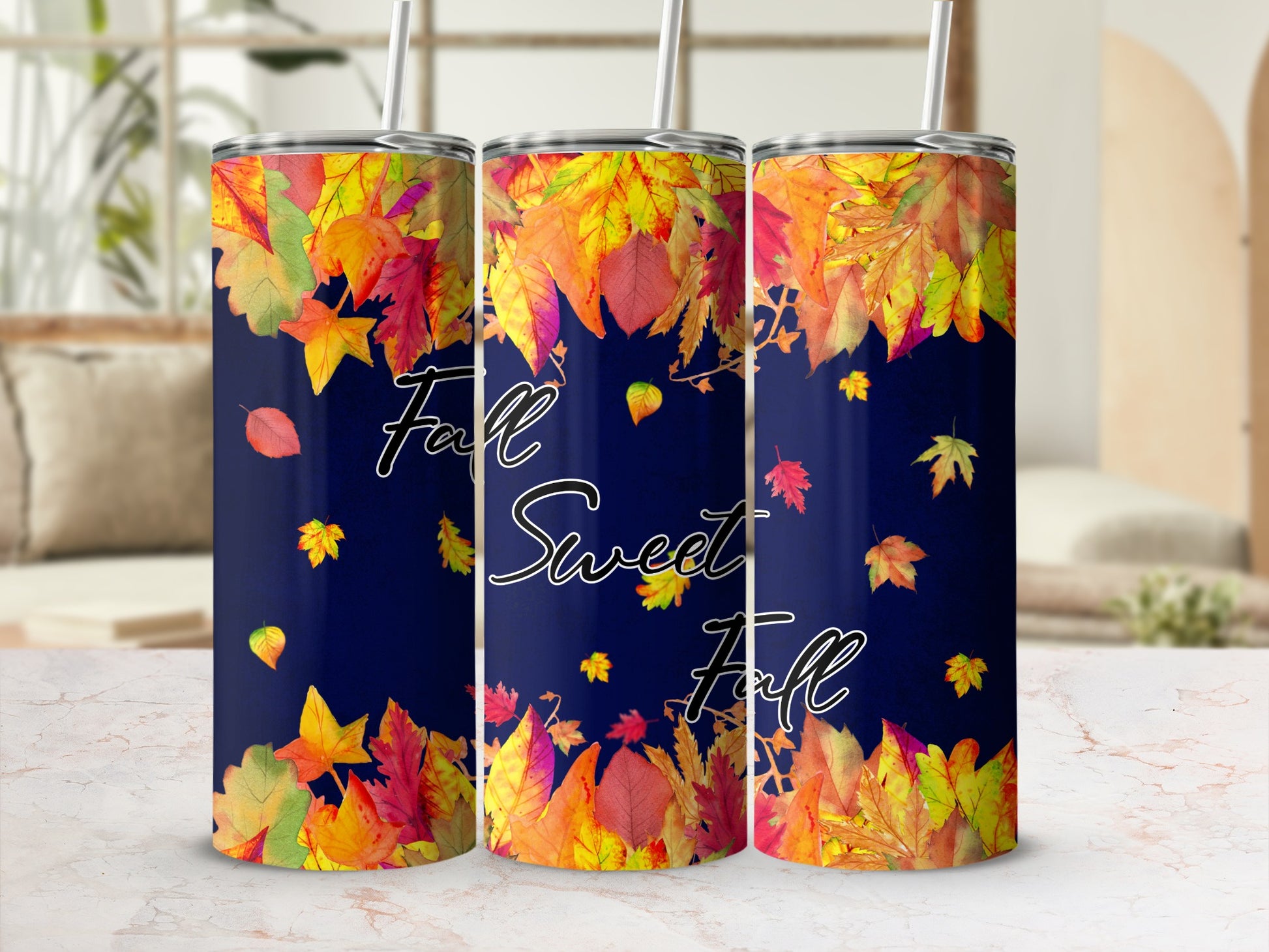 Three tumblers with colorful fall leaves and "Fall Sweet Fall" text.