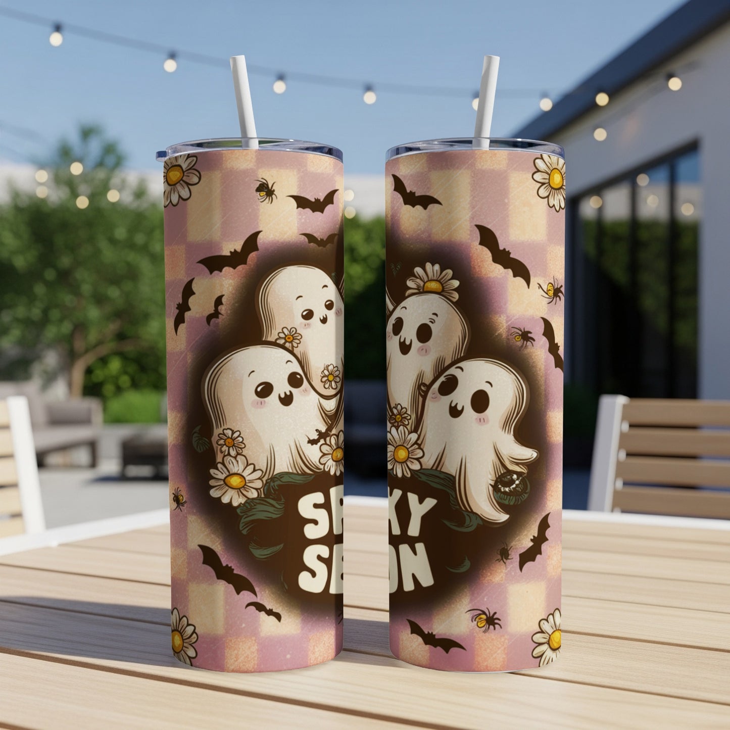 Two tumblers with cute ghosts, bats, spiders, and flowers, reading "Spooky Season".