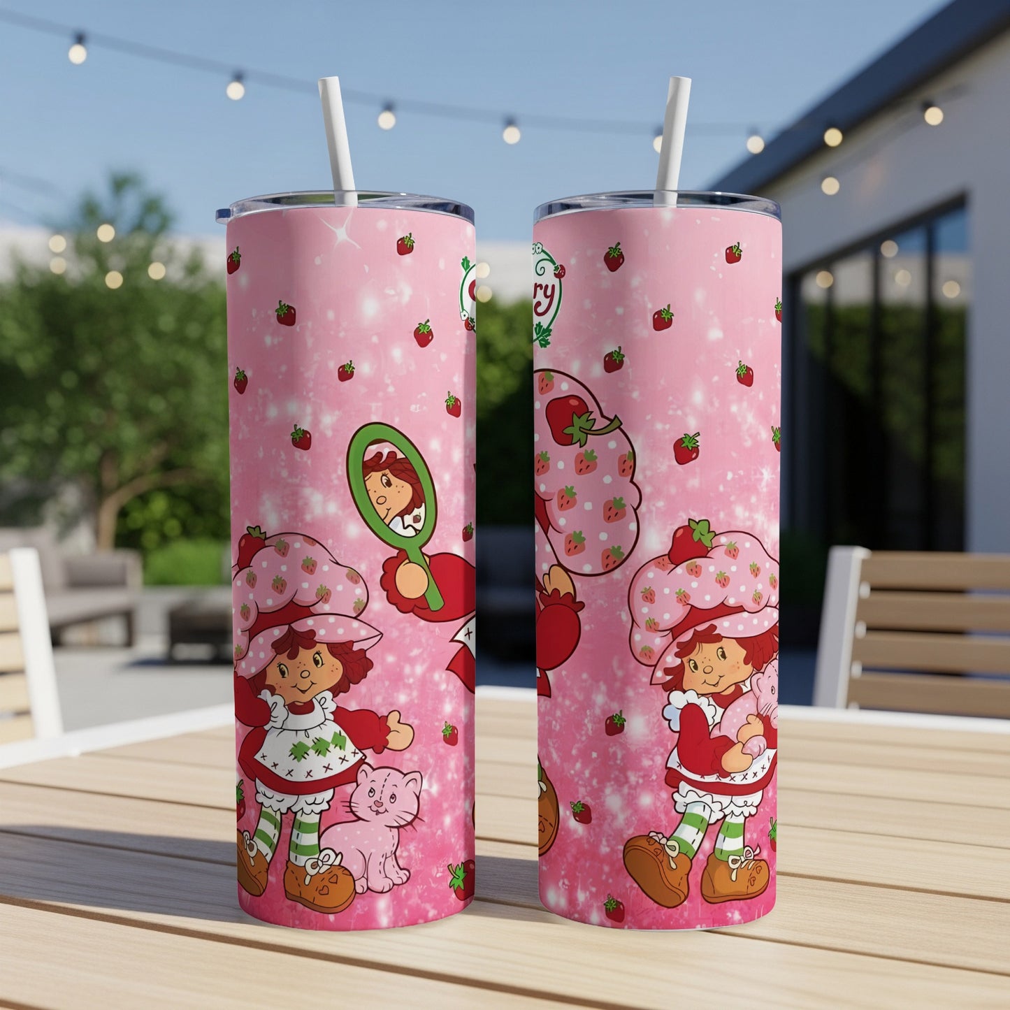 Strawberry Shortcake and cat illustration on pink glittery tumbler.