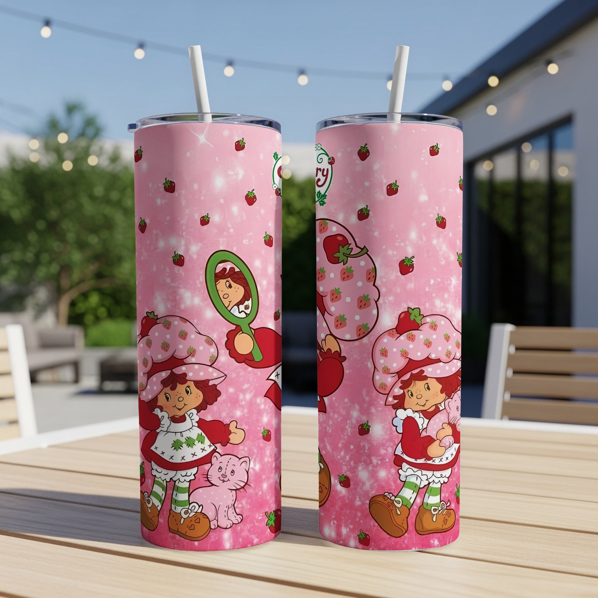 Strawberry Shortcake and cat illustration on pink glittery tumbler.