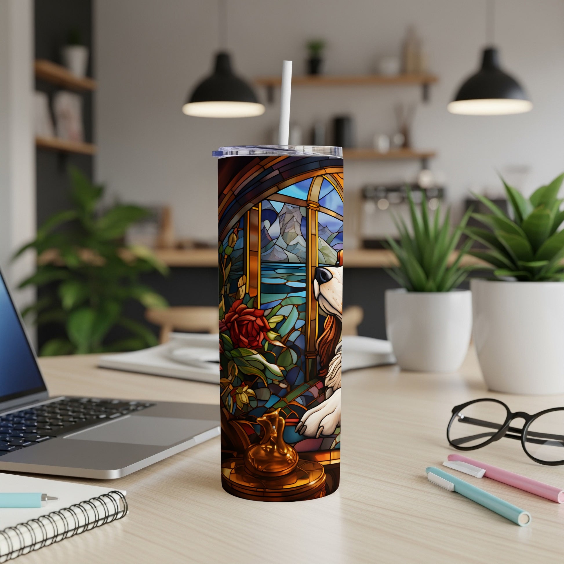 Tumbler with stained glass art of a dog, rose, and mountain landscape.