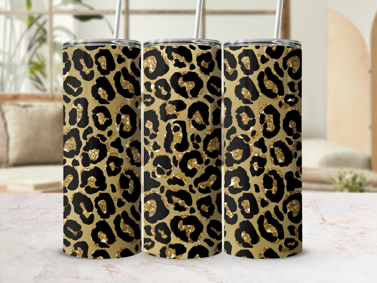 Three tumblers with a glittery leopard print pattern.