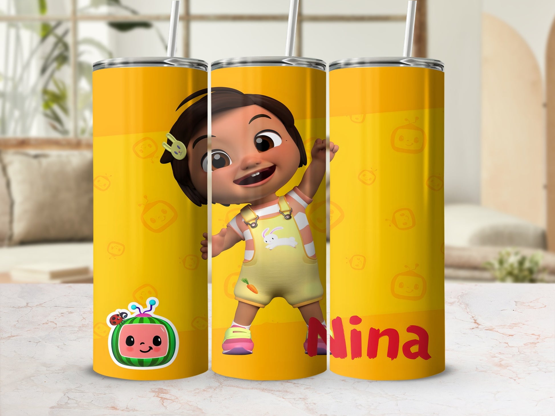 Cocomelon character on yellow tumbler with "Nina" text.