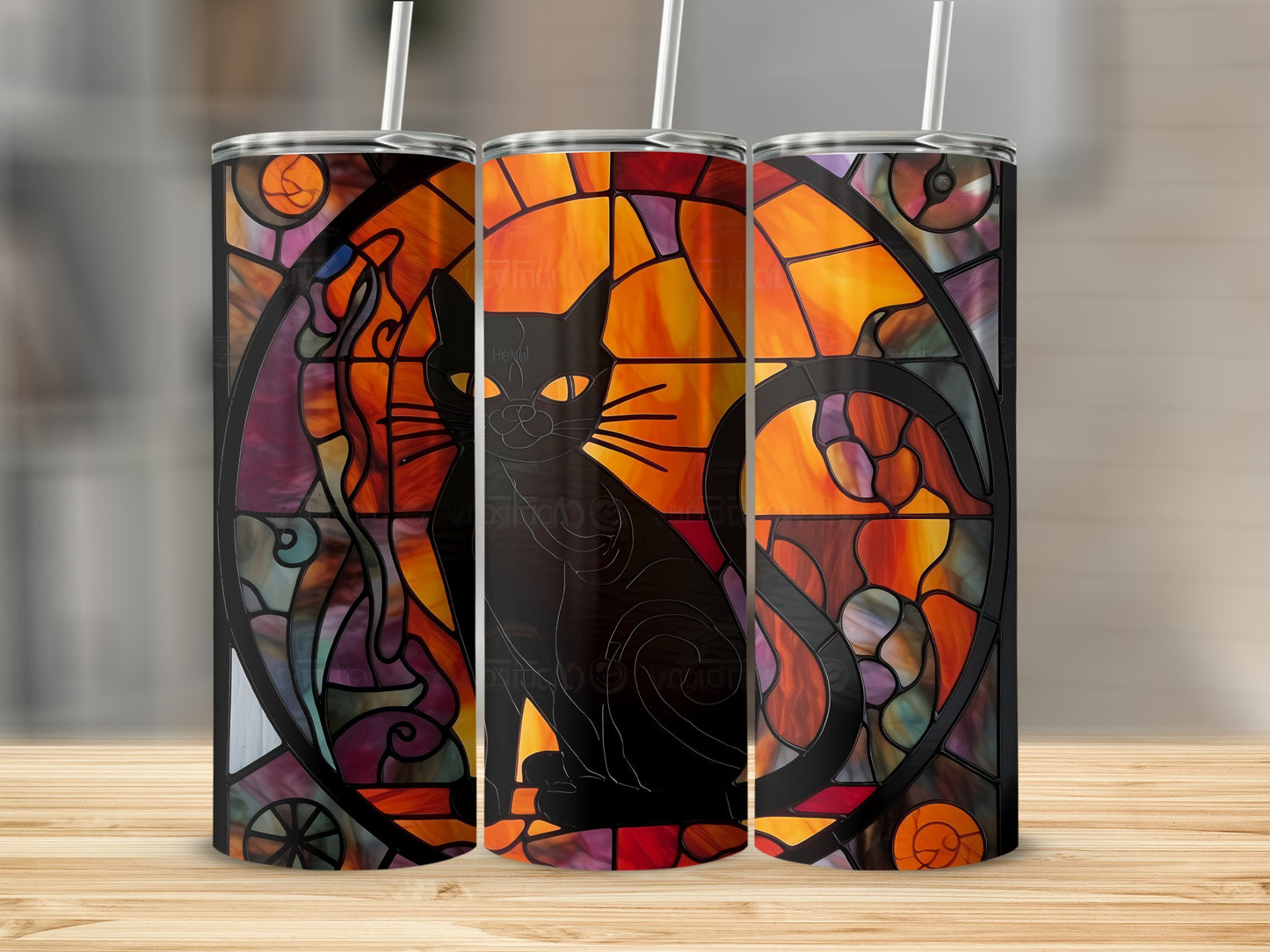 Black cat in stained glass design on three tumblers.