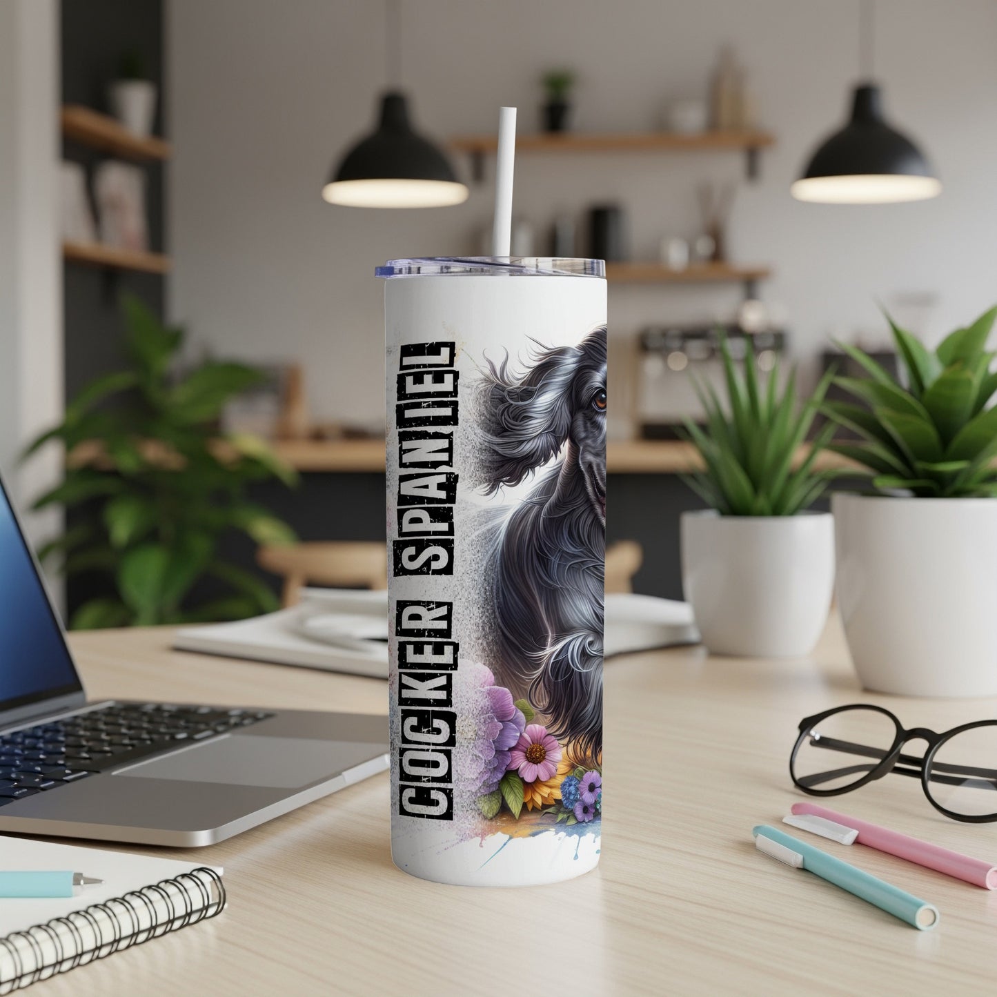 Black Cocker Spaniel design on white tumbler with colorful flowers and text.