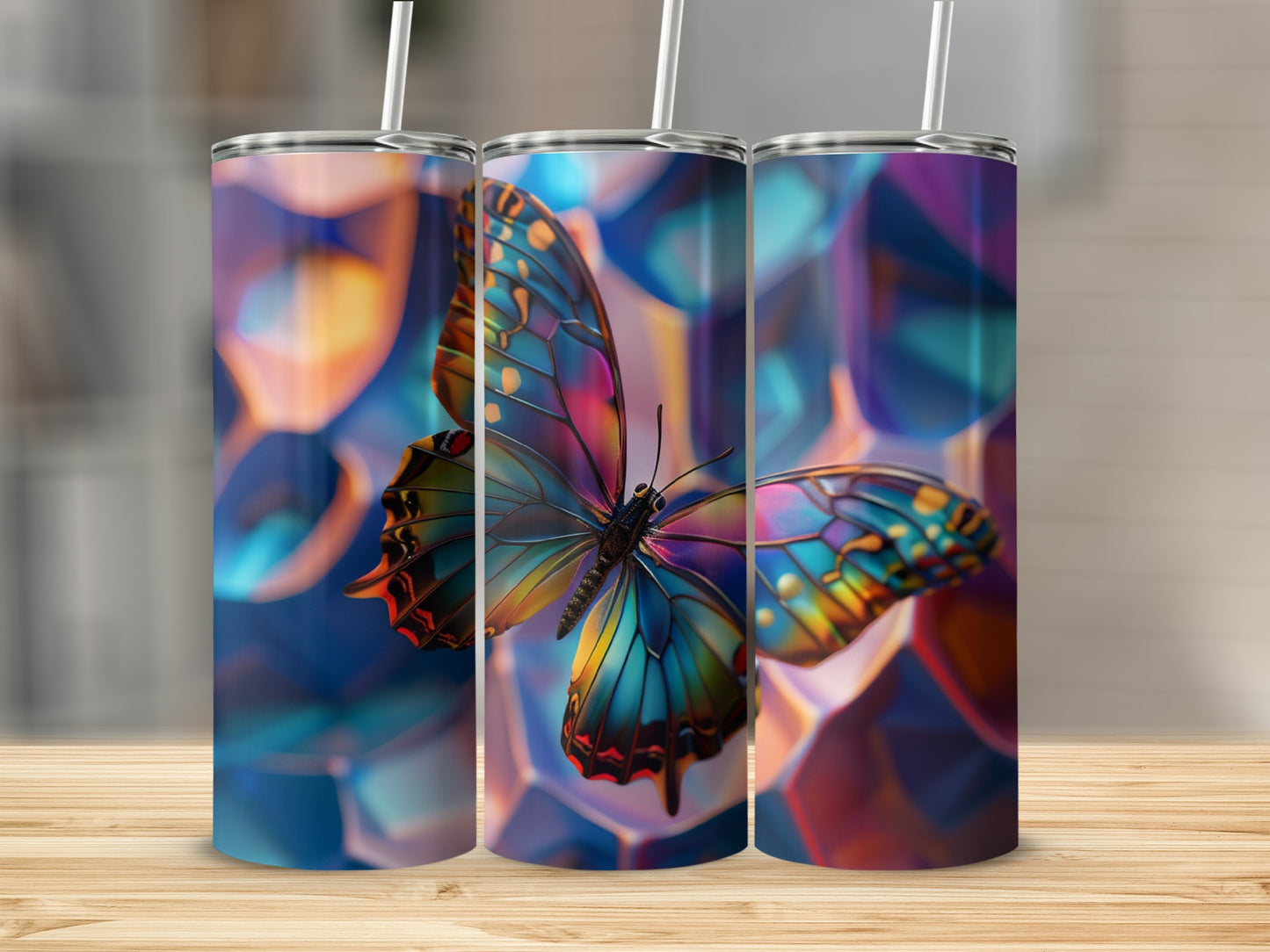 Three colorful butterfly tumblers with geometric crystal background.