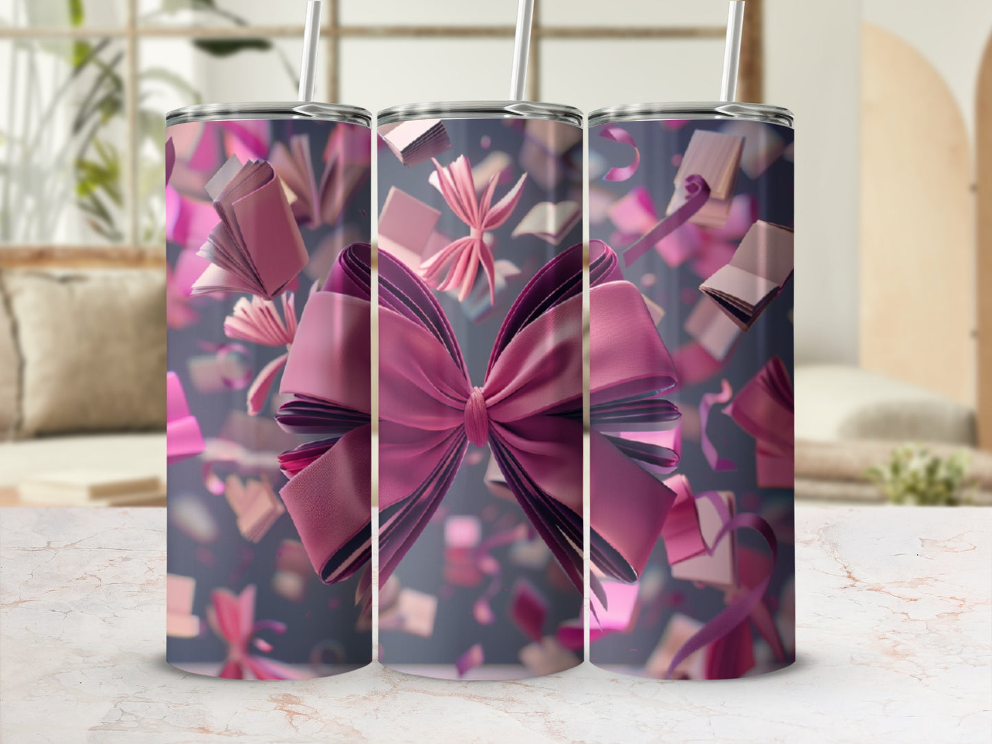 Pink bow and confetti pattern on three tumblers.