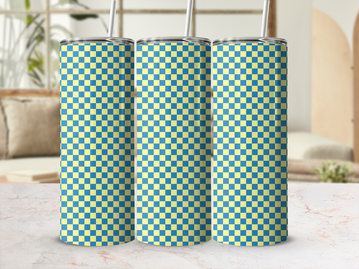 Three tall tumblers with blue and yellow checkerboard pattern.