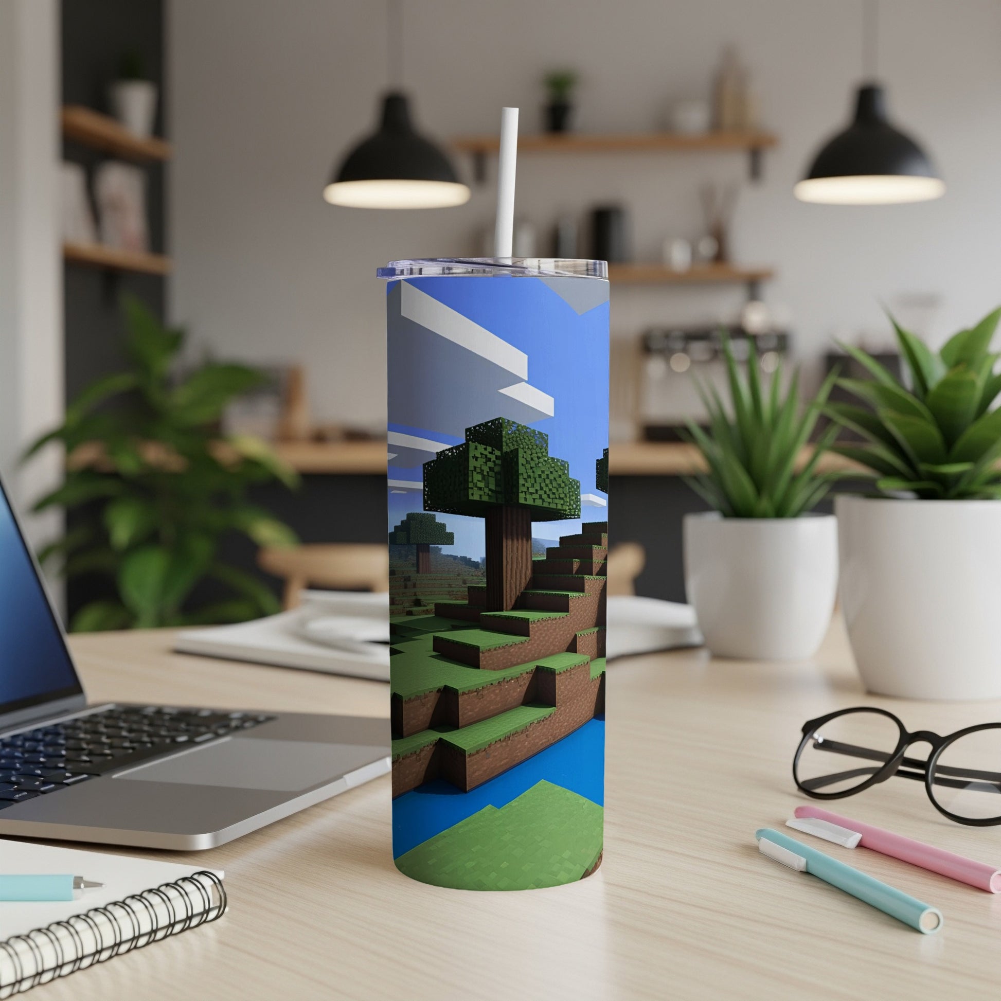Minecraft tumbler with grass, trees, and water scene.