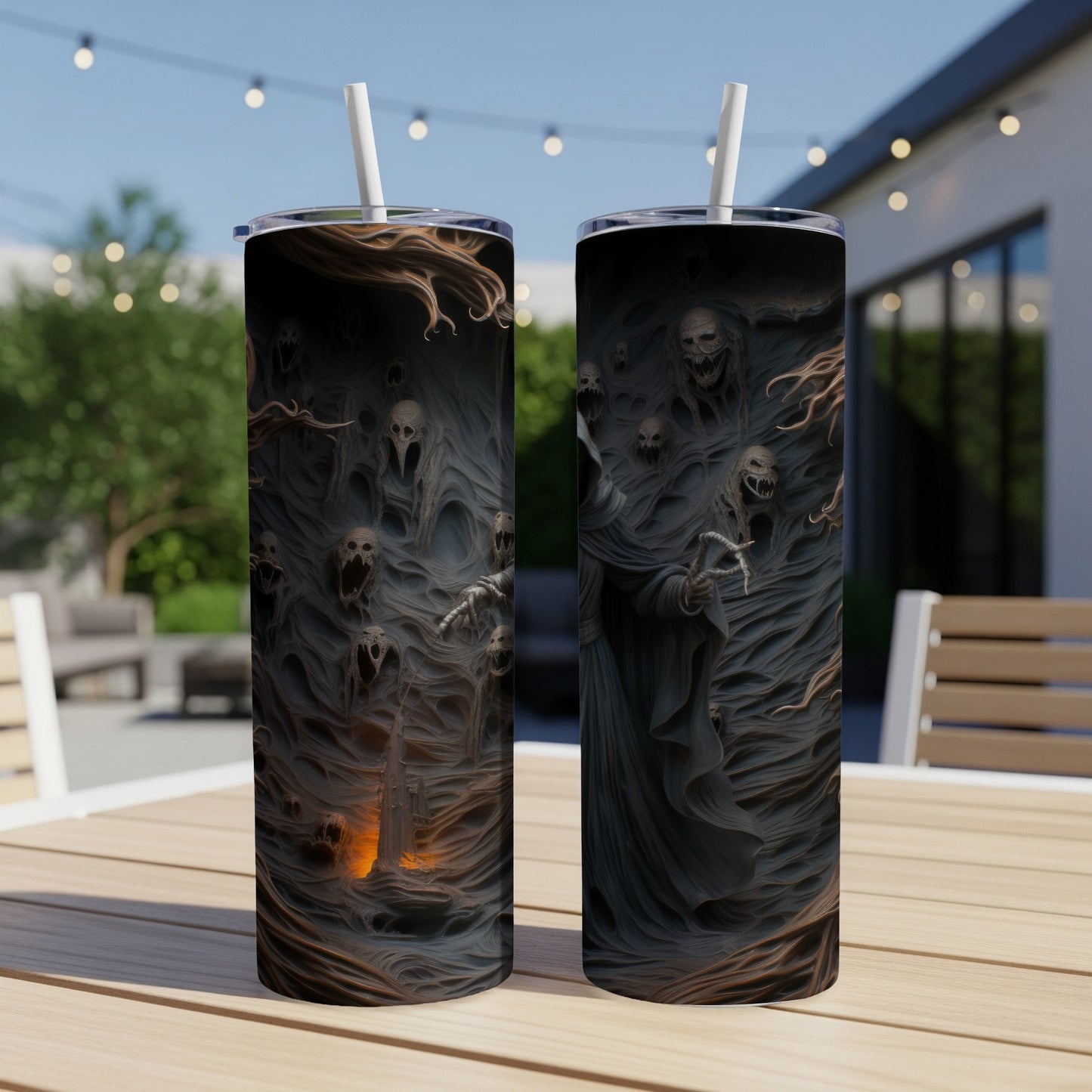 Two tumblers with a dark, gnarled design featuring skeletal faces and a hooded figure.