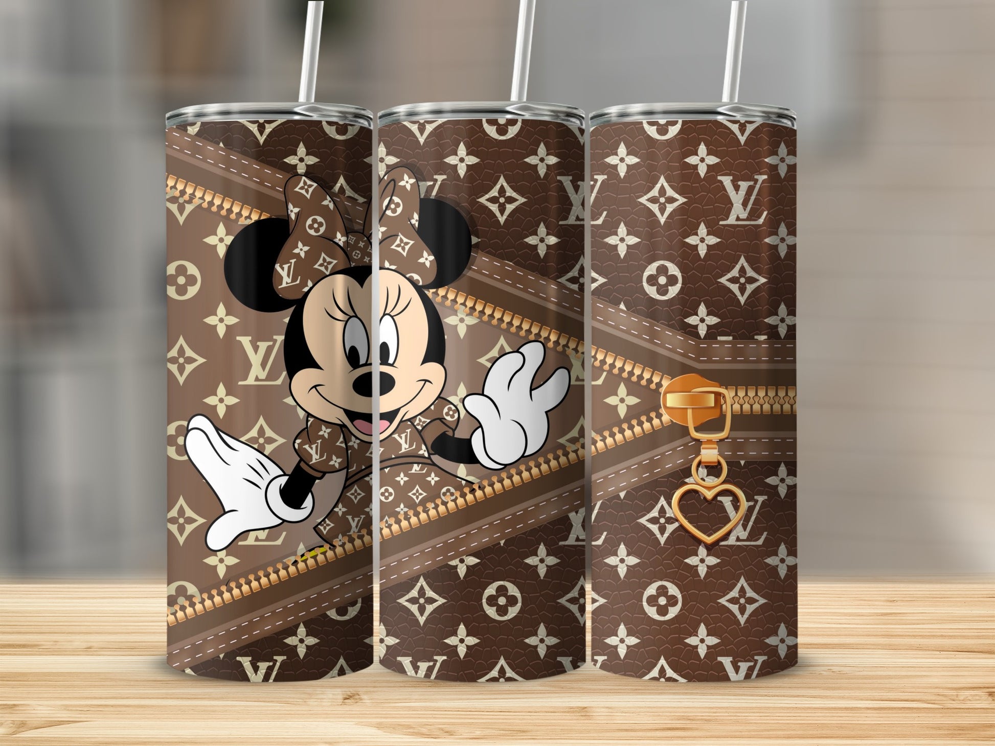Minnie Mouse on a Louis Vuitton-inspired tumbler with zipper and heart charm.