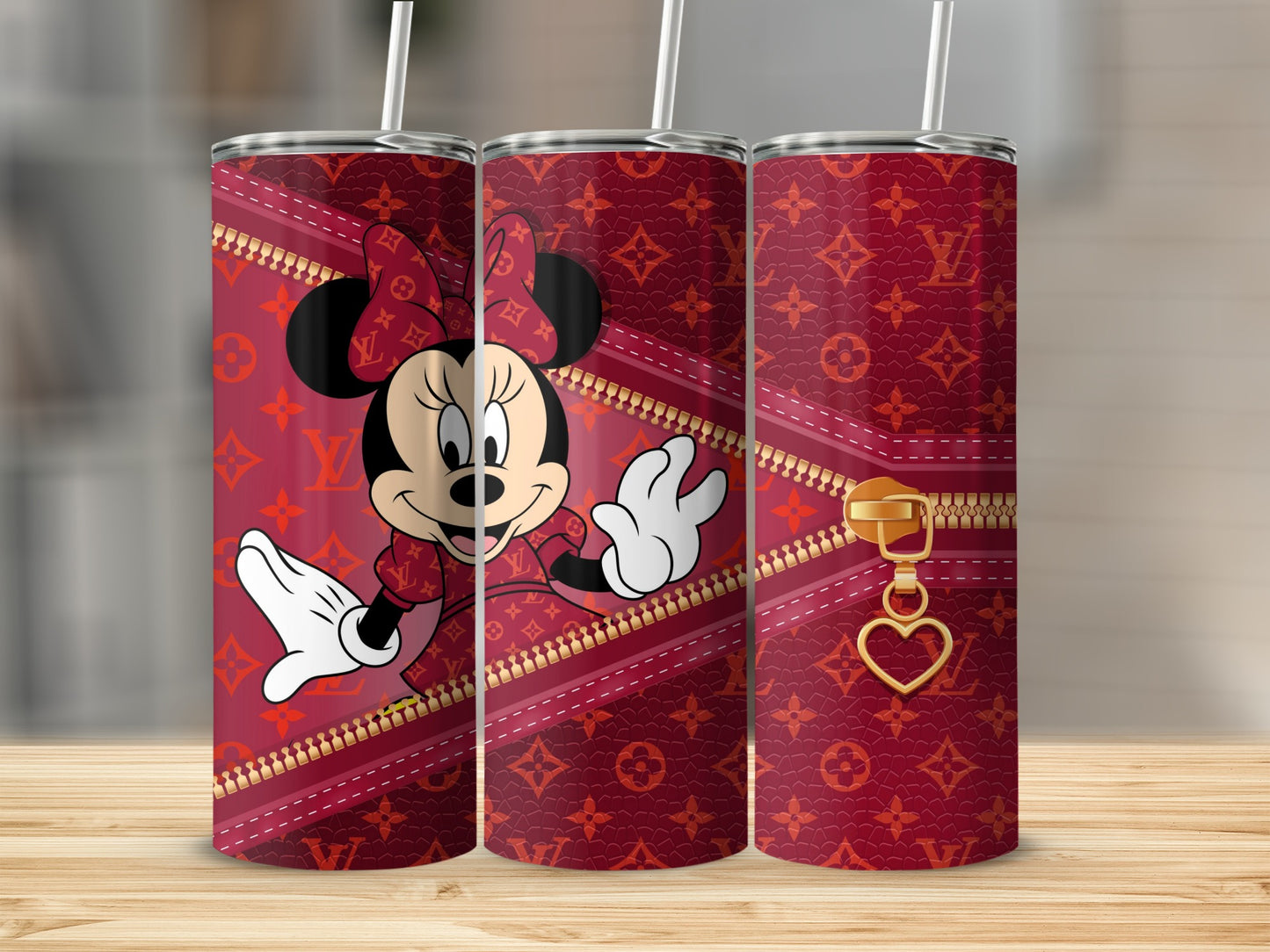 Minnie Mouse on a red tumbler with zipper and gold heart charm.