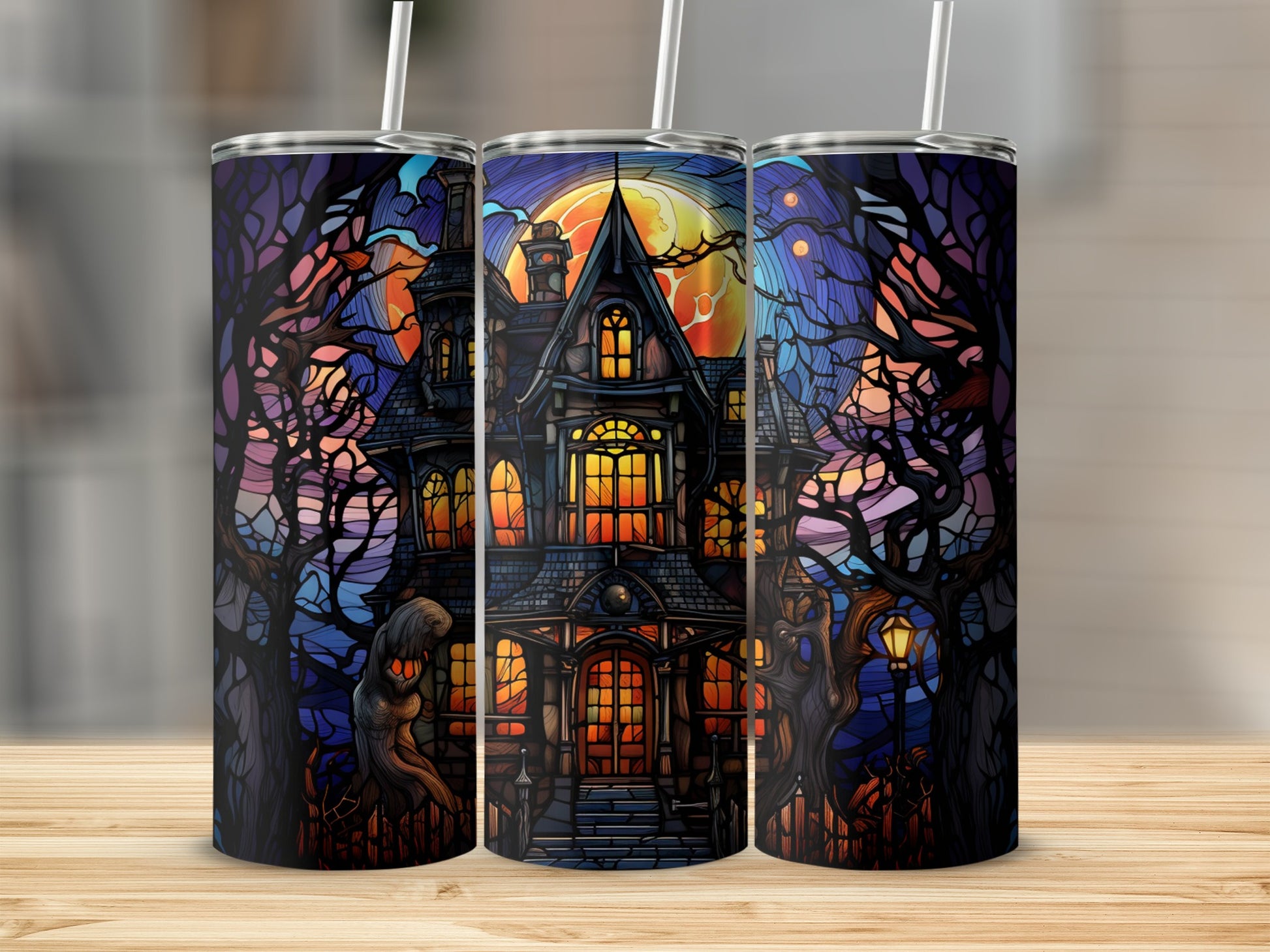 Haunted house with stained glass design and moon on a tumbler.