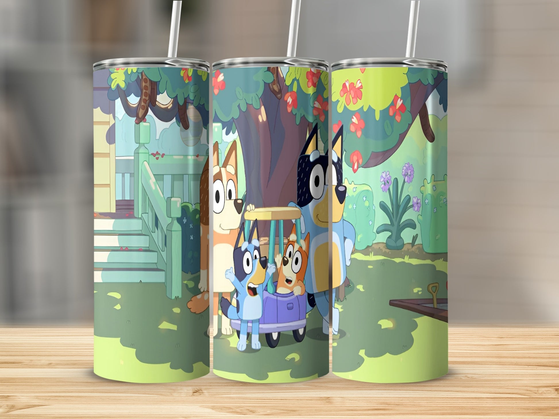 Bluey characters in a wagon in a backyard scene on a tumbler.