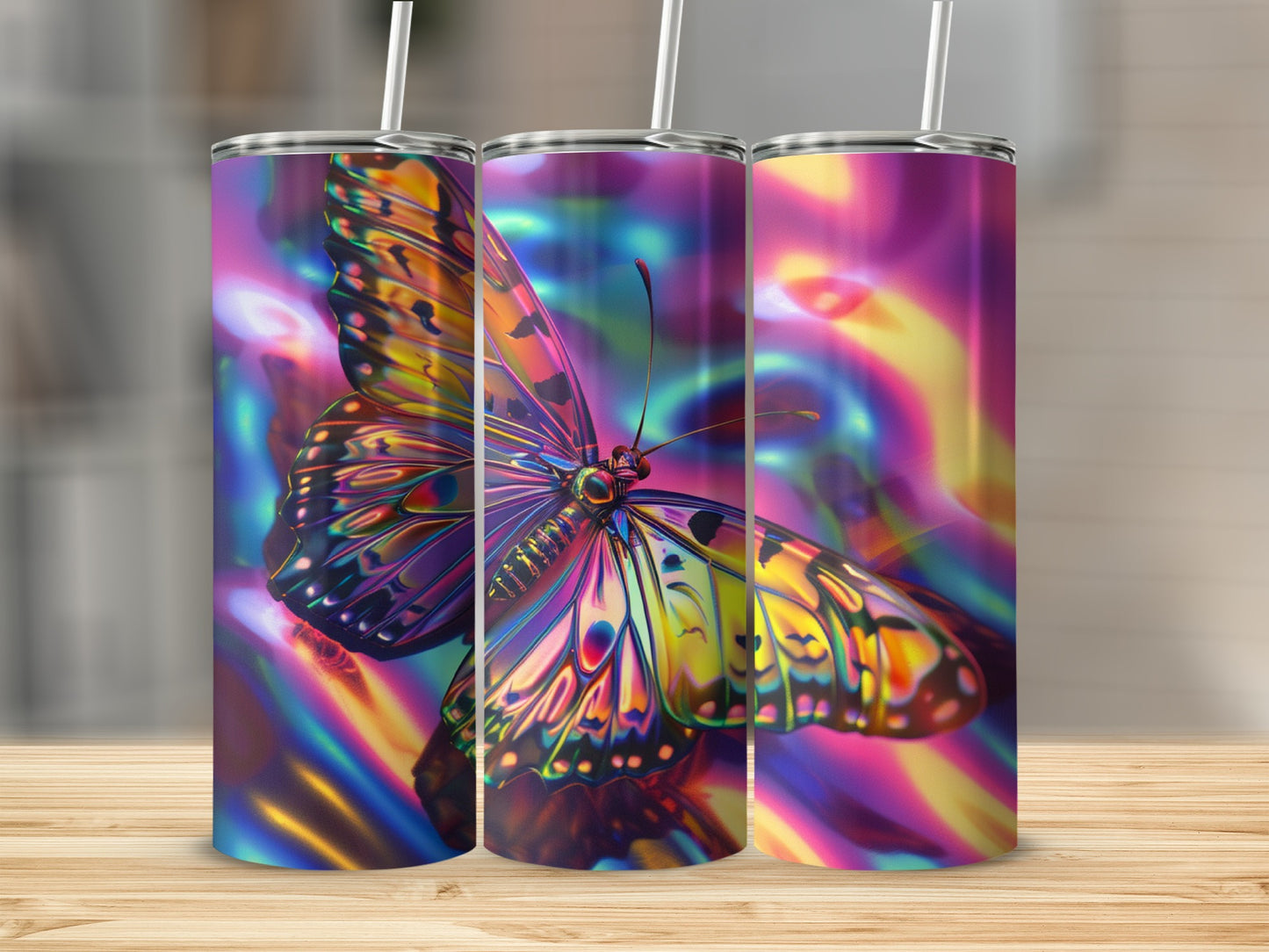 Three tumblers featuring a vibrant, iridescent butterfly against a psychedelic background.