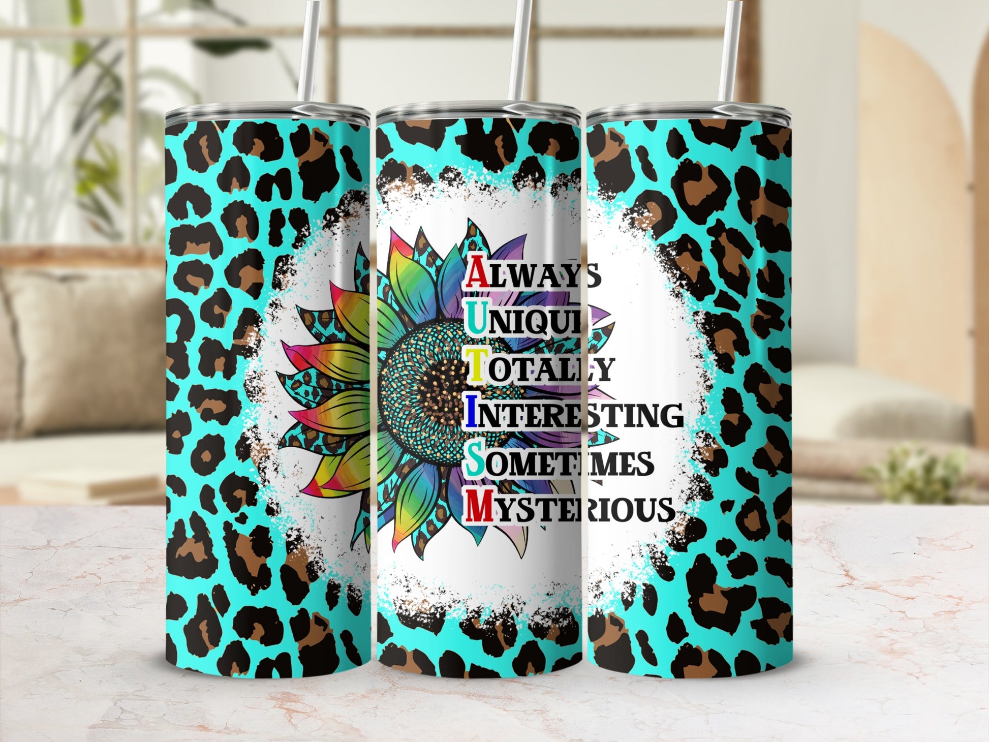 Tumbler with leopard print and rainbow autism flower with text.