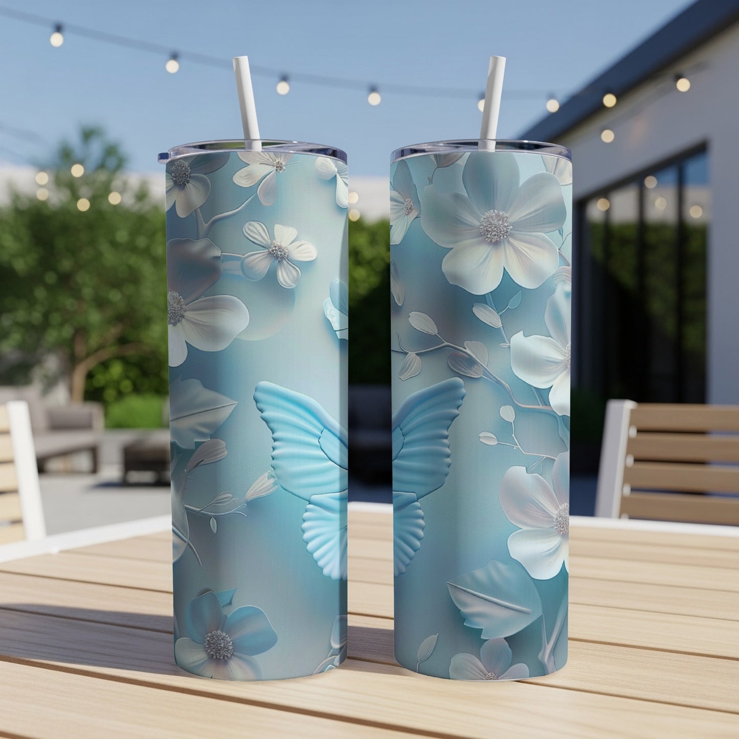 Two tall tumblers with a light blue butterfly and floral pattern.