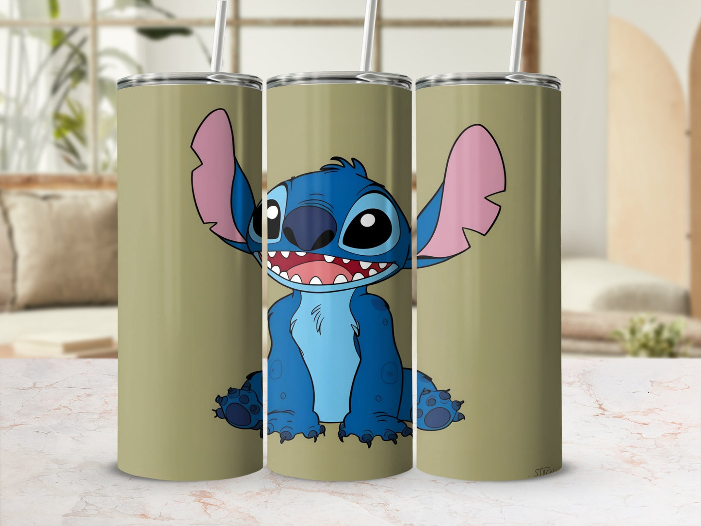 Blue alien character Stitch smiling with open mouth on a tan tumbler.