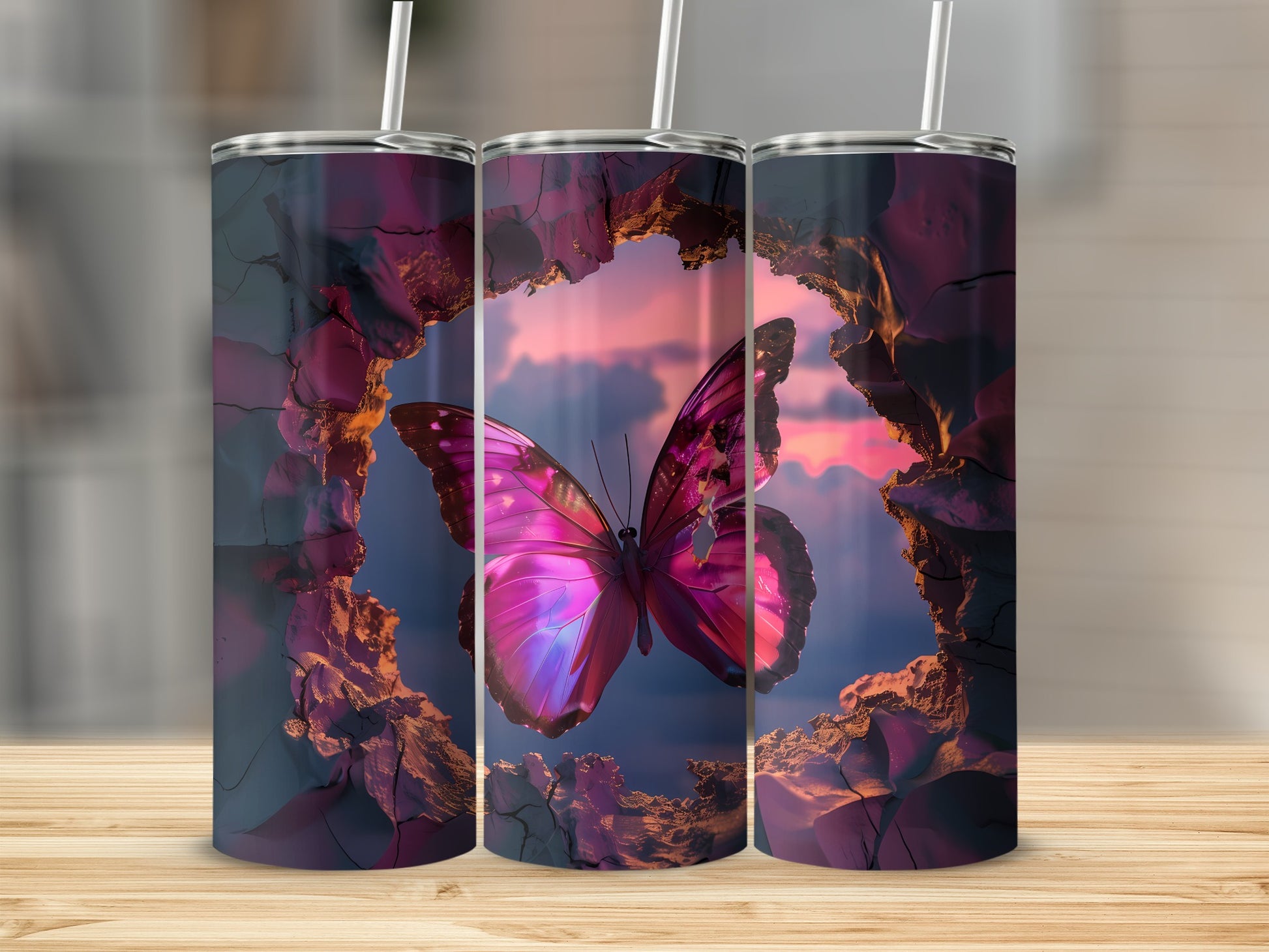 Three tumblers with a pink butterfly framed by cracked rock against a sunset sky.