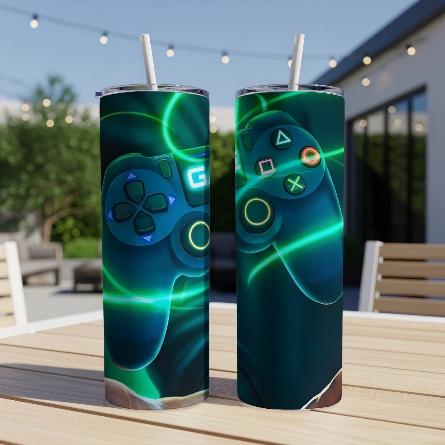 Two tumblers with a green glowing video game controller design.