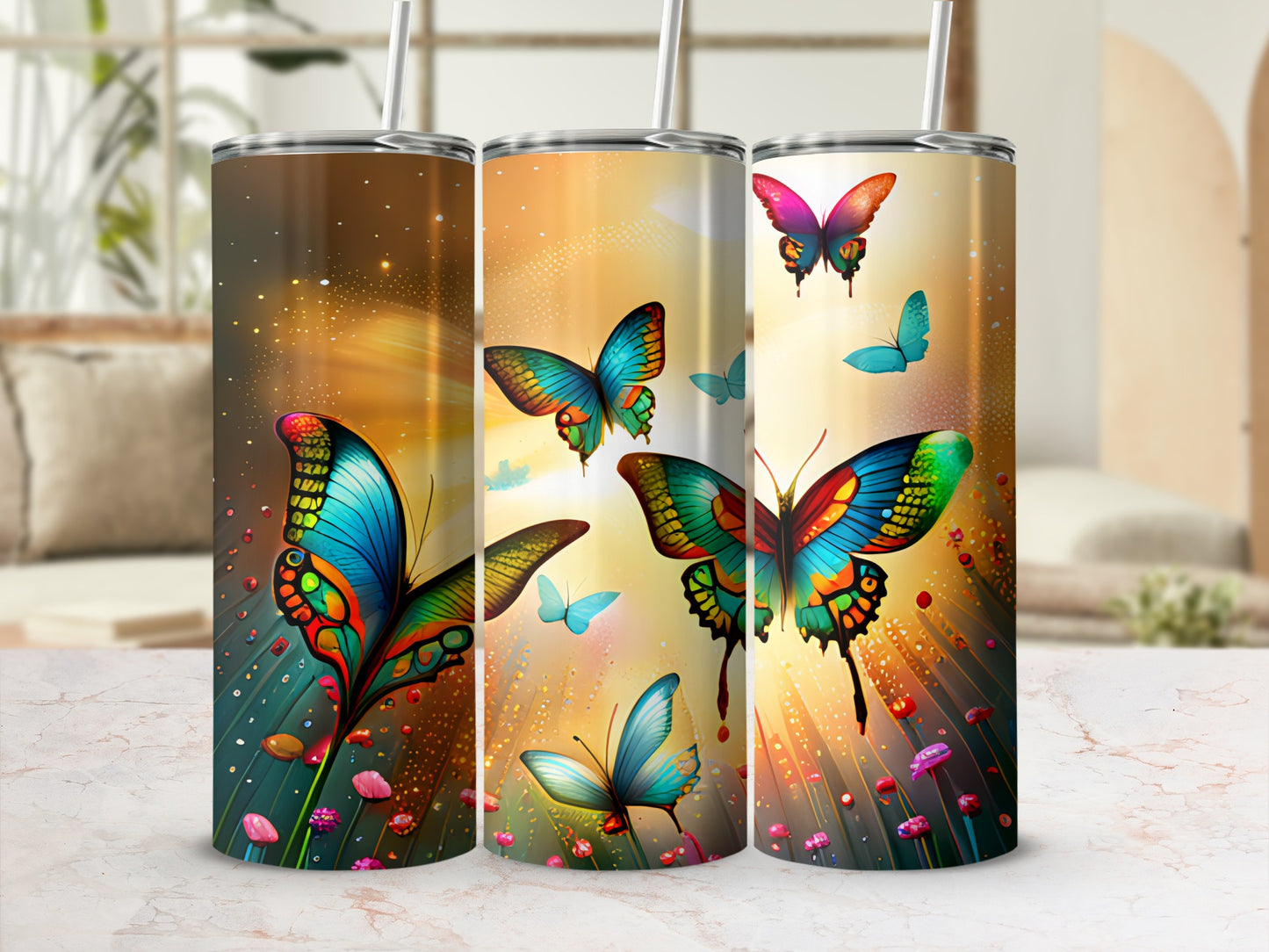 Three tumblers featuring colorful butterflies and floral accents.