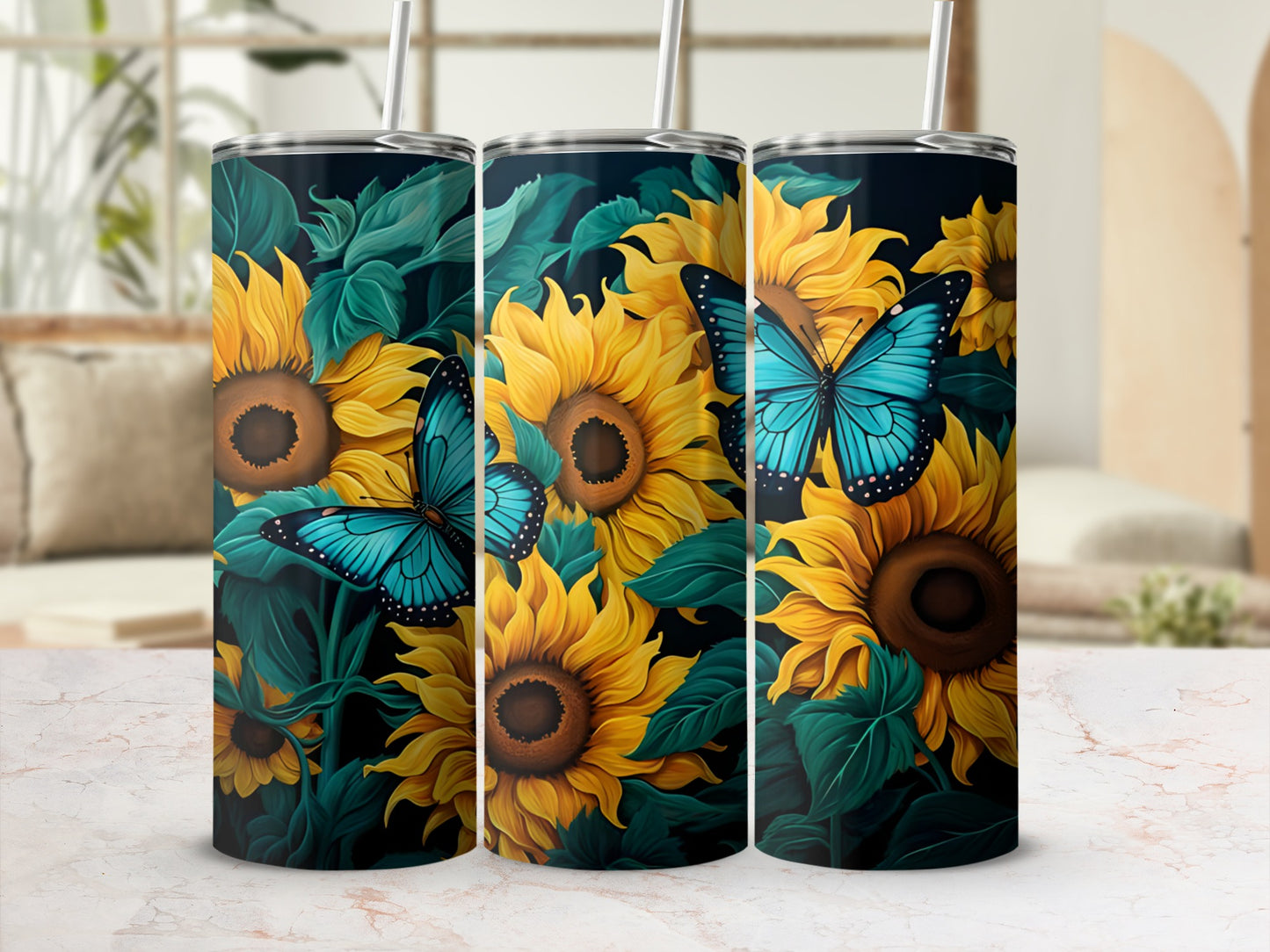 Three tumblers with sunflowers and blue butterflies on a dark background.
