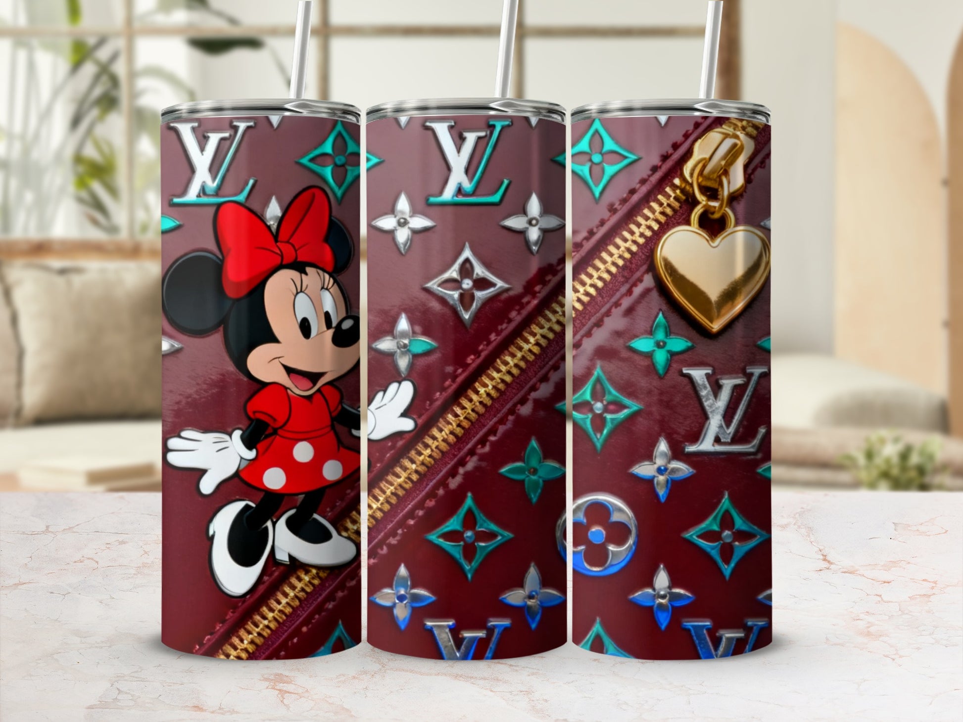 Minnie Mouse on a burgundy tumbler with LV pattern and gold zipper charm.