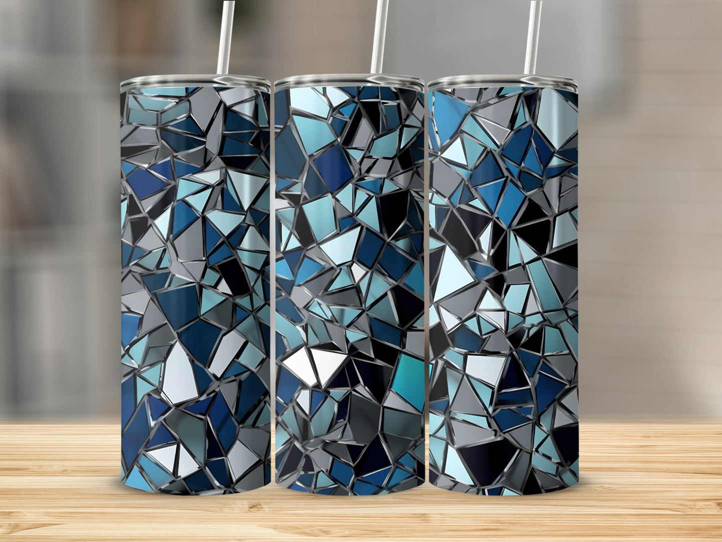 Tall tumblers with abstract blue and gray geometric shattered glass design.