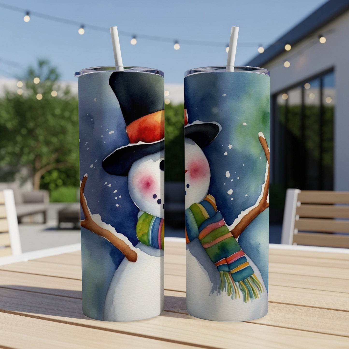 Two snowmen with colorful scarves and hats on a wooden table.