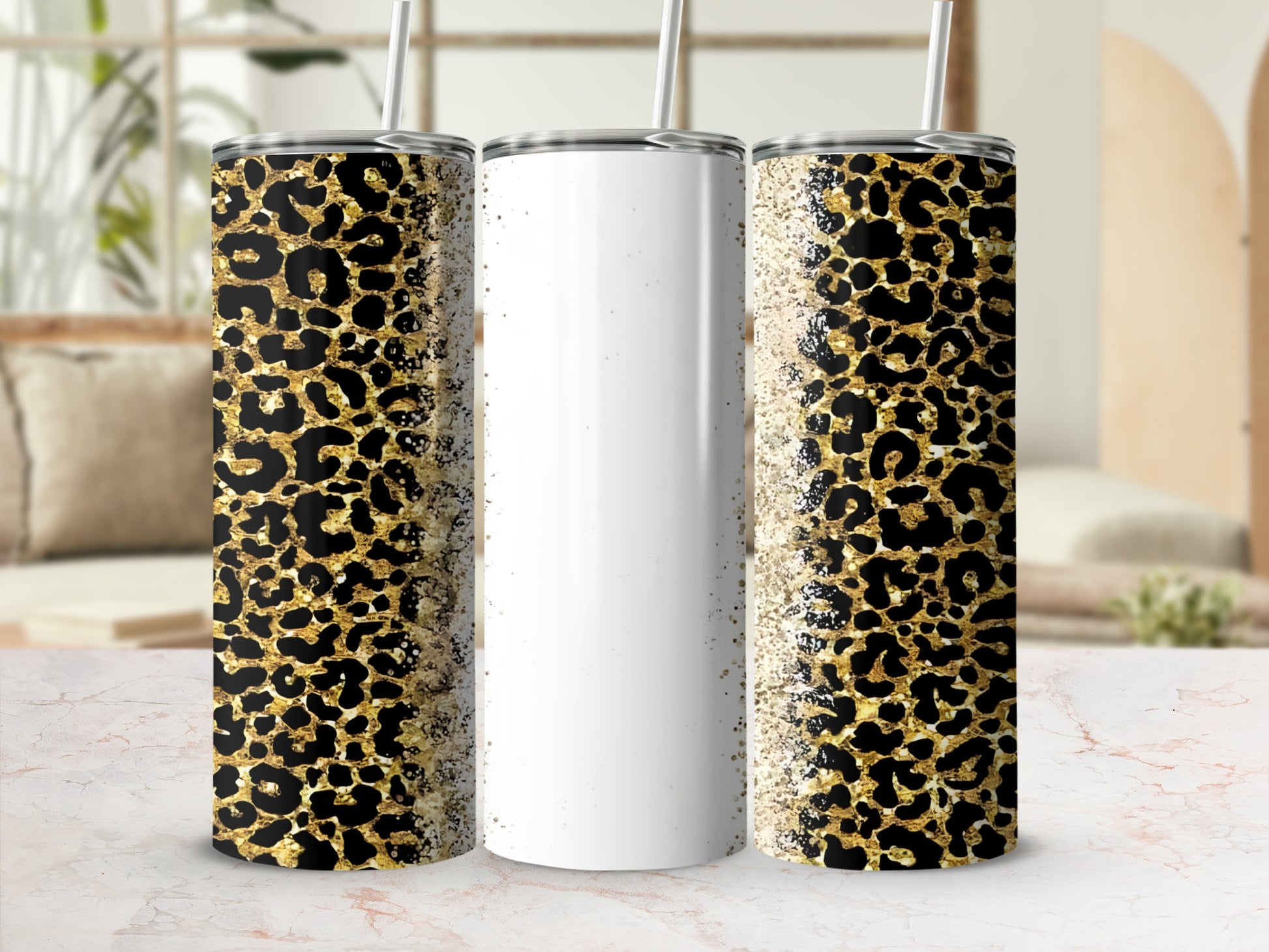 White tumbler with gold leopard print and glitter accents.