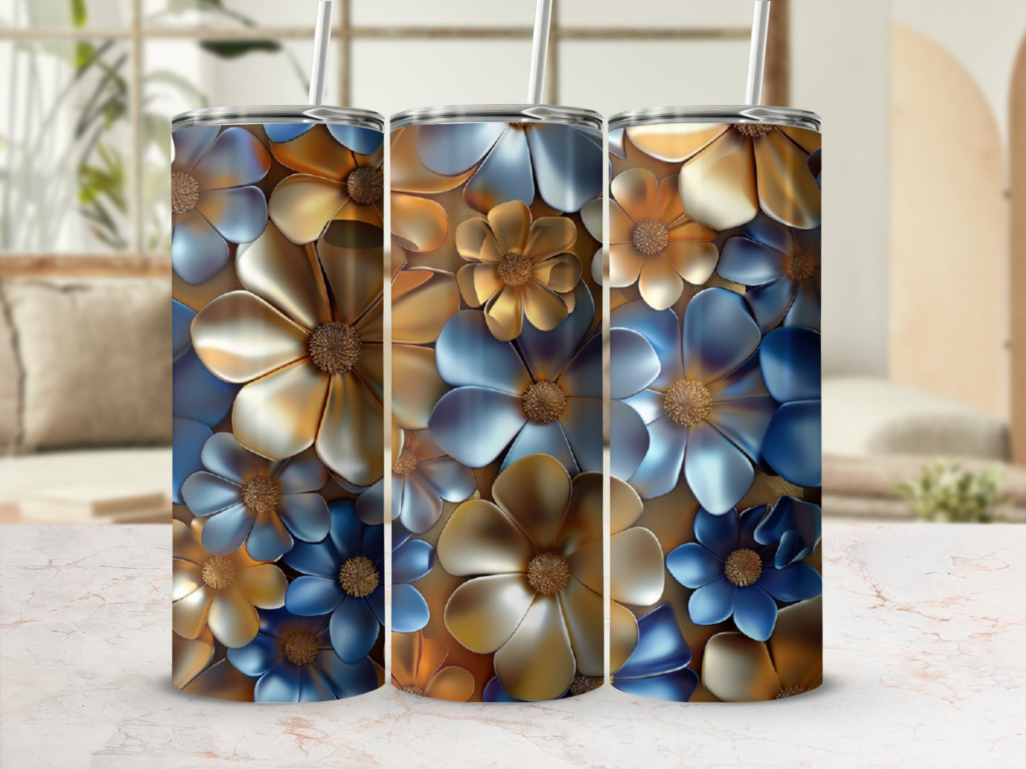 Three tumblers with a floral design featuring blue and gold metallic flowers.
