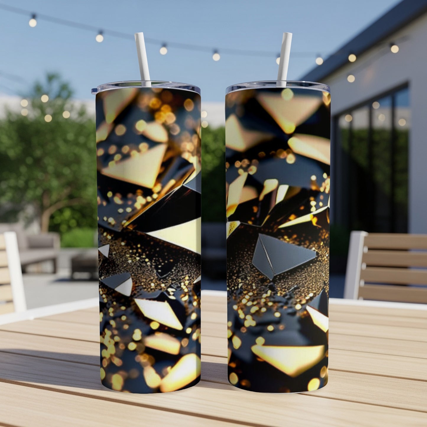 Two tumblers with abstract geometric shards and bokeh light effect.