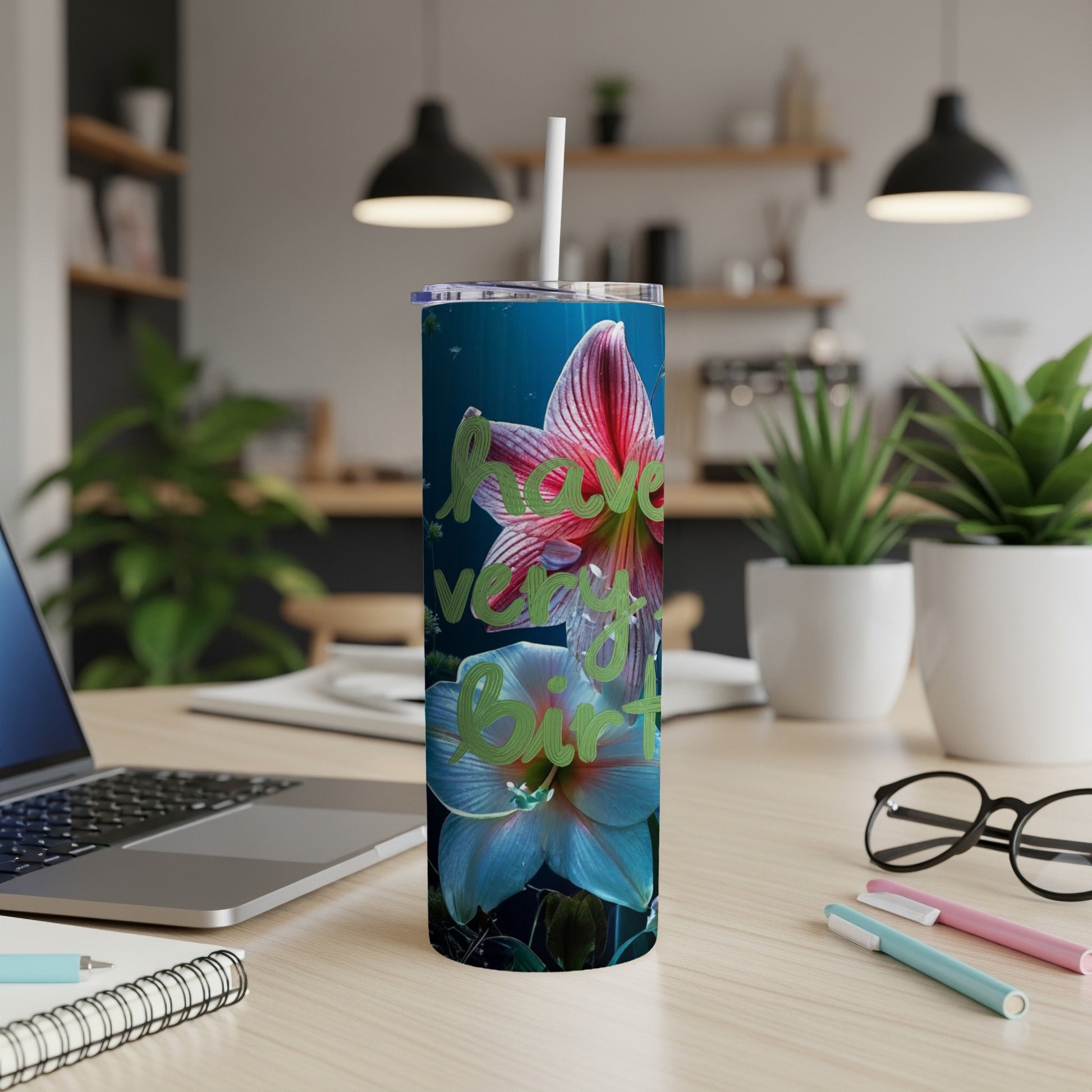 Tall tumbler with "Happy Birthday" text over floral design.