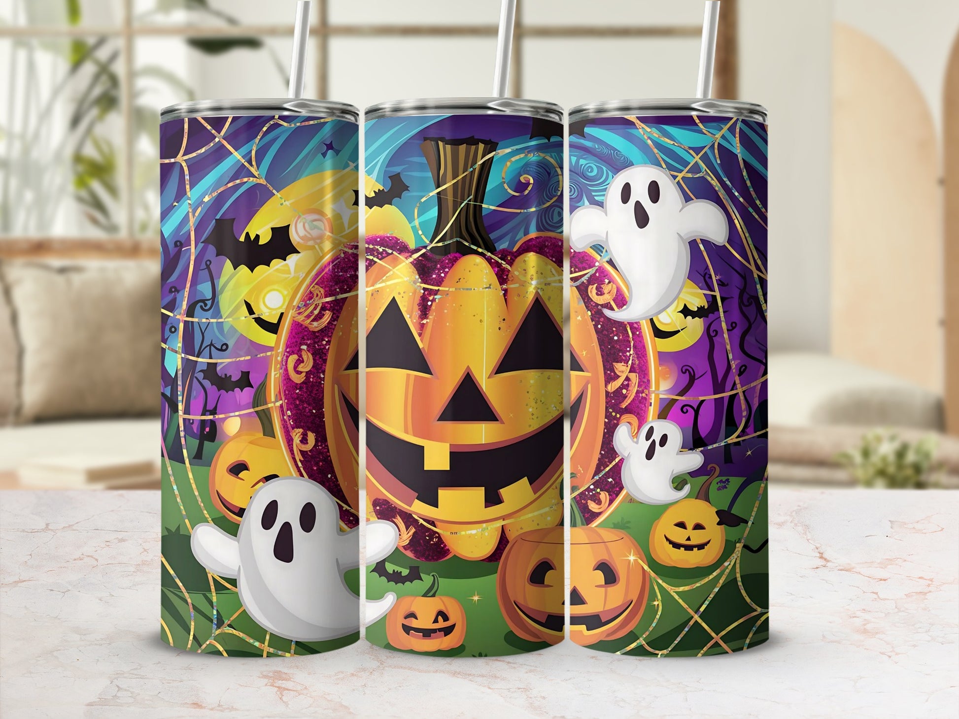 Three Halloween-themed tumblers with pumpkins, ghosts, and bats on a purple and green background.