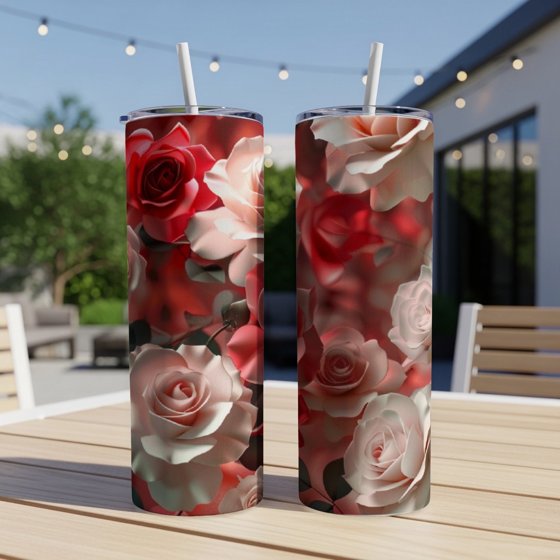 Two tall tumblers with a close-up floral rose pattern.
