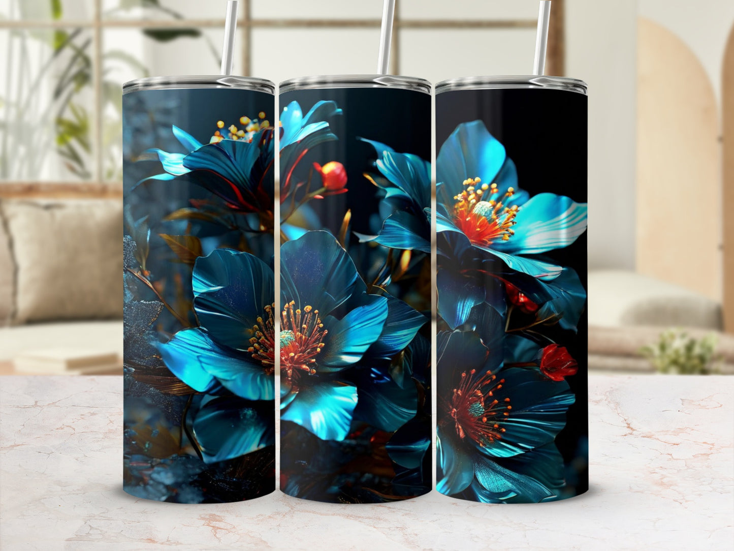 Three tall tumblers featuring vibrant blue and orange floral designs.