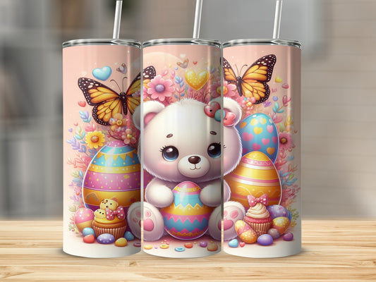 Cute teddy bear with Easter eggs and butterflies on a pink tumbler.