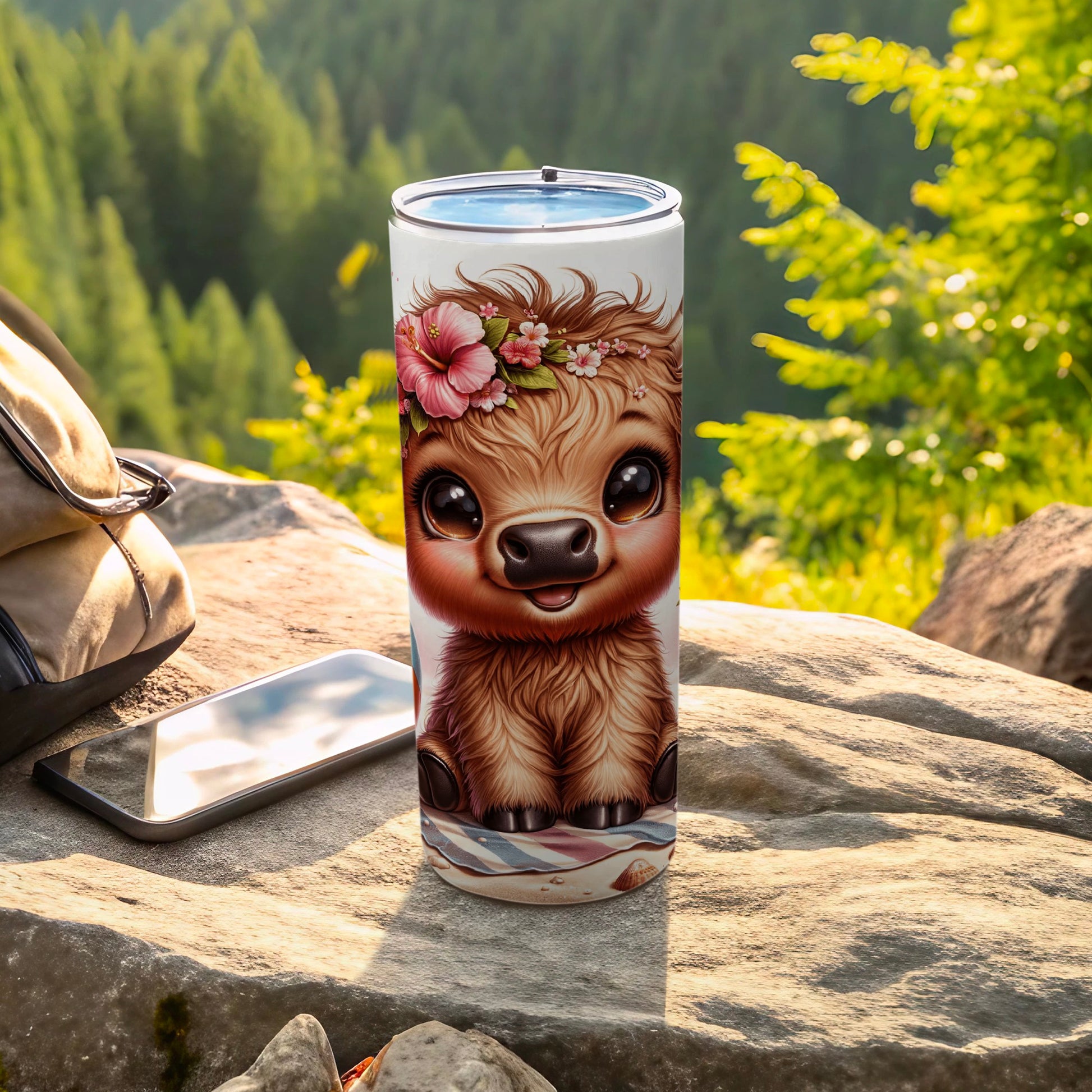 Cute cartoon sloth with flower crown on tumbler beside phone and backpack.