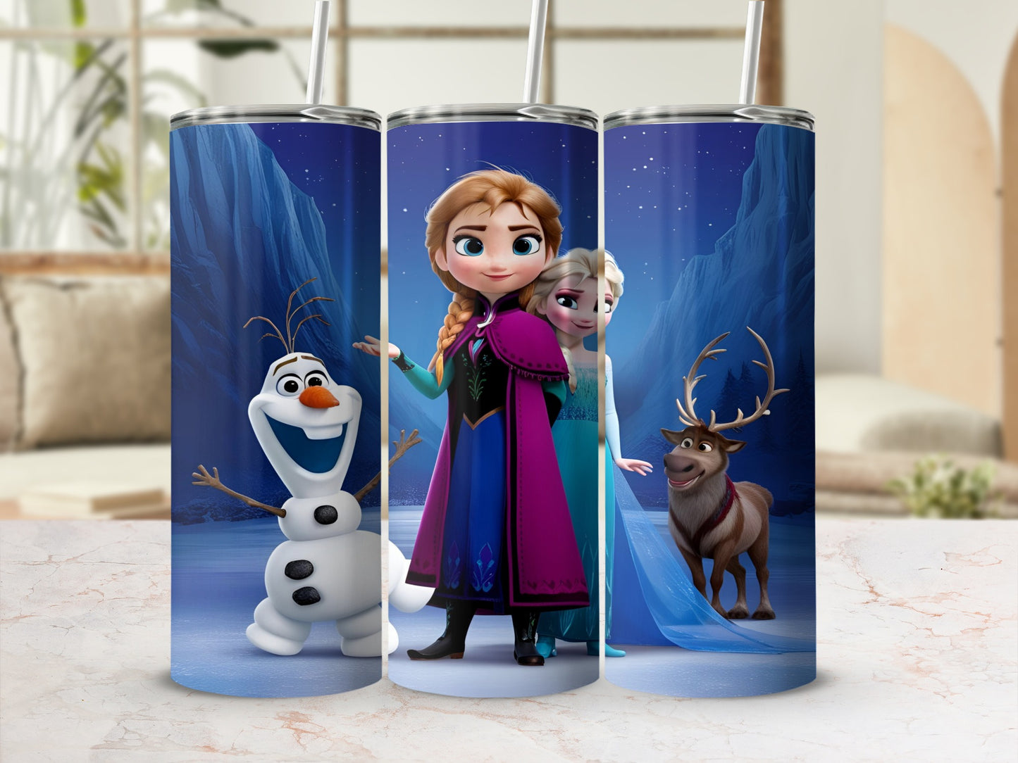 Olaf, Anna, and Elsa from Frozen with Sven the reindeer on a tumbler.