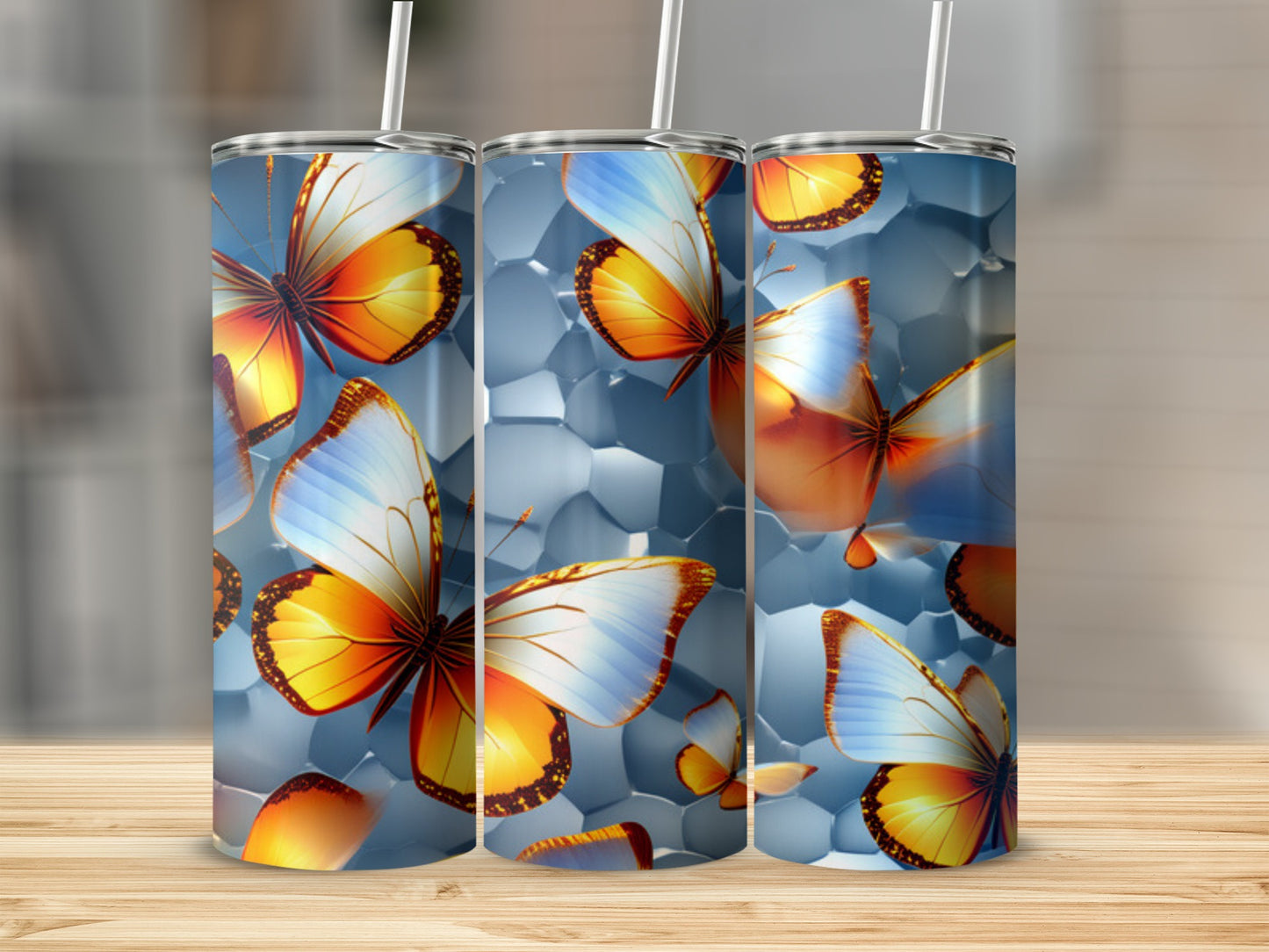 Three tumblers with butterfly and geometric patterns.