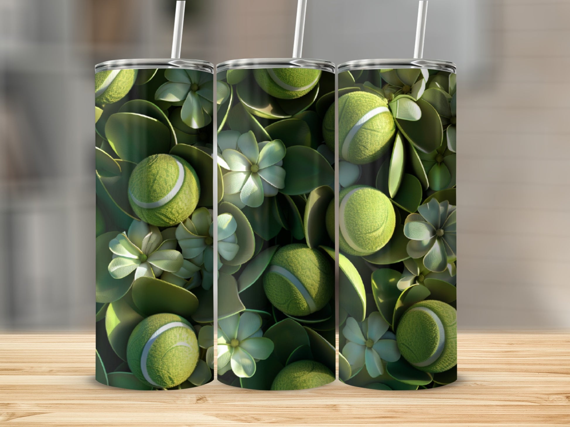 Three tumblers with a tennis ball and floral pattern.